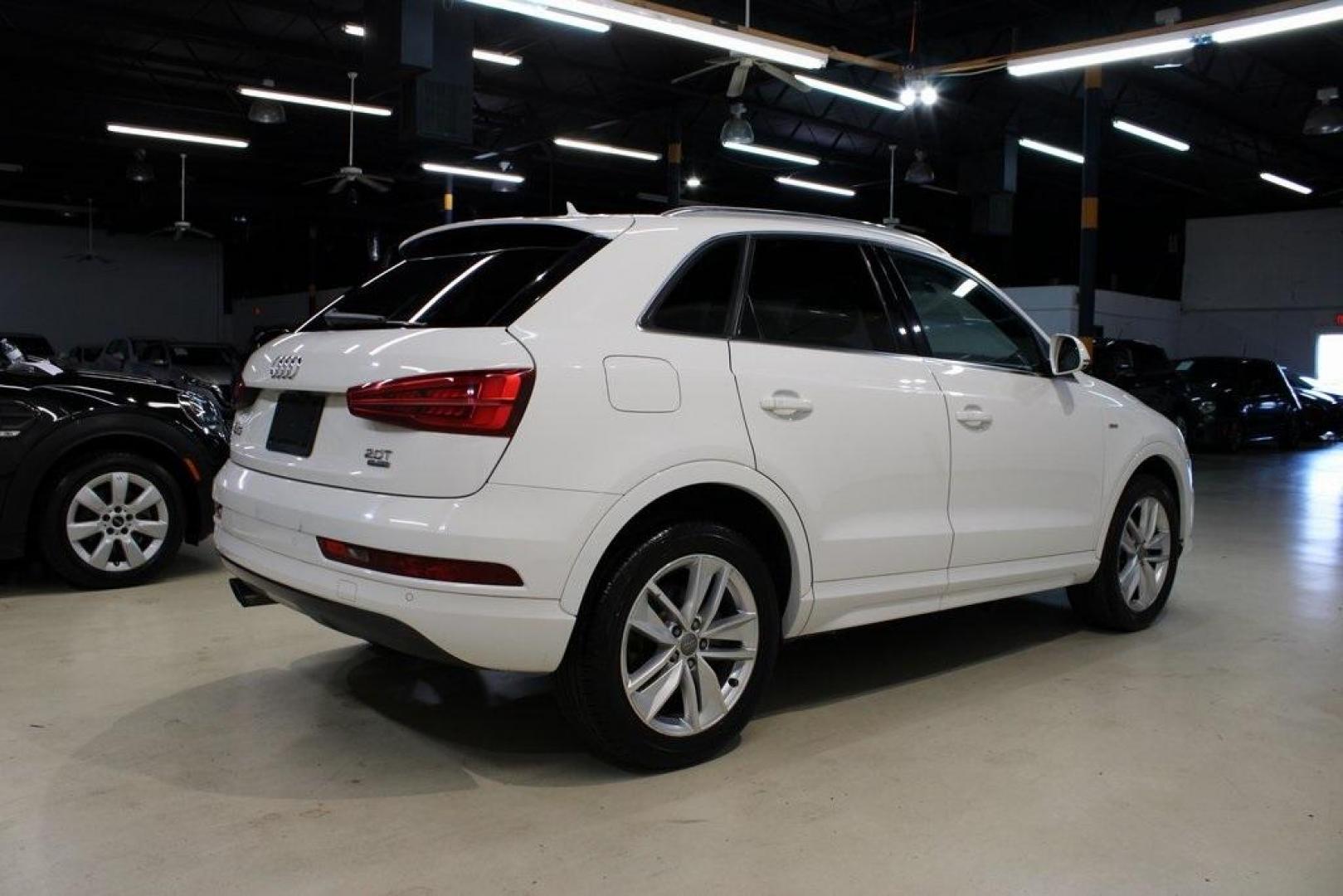 2018 White Audi Q3 2.0T Premium (WA1JCCFS3JR) with an 2.0L 4-Cylinder TFSI engine, Automatic transmission, located at 15300 Midway Rd., Addison, TX, 75001, (972) 702-0011, 32.958321, -96.838074 - 2018 Audi Q3 Premium Plus<br>Now Available at Midway Auto Group Addison, Texas<br><br>Luxury meets agility in the 2018 Audi Q3 Premium Plus a compact SUV that delivers upscale comfort, sharp handling, and Audi's signature design. Perfectly sized for urban driving yet equipped for weekend getaways, - Photo#2