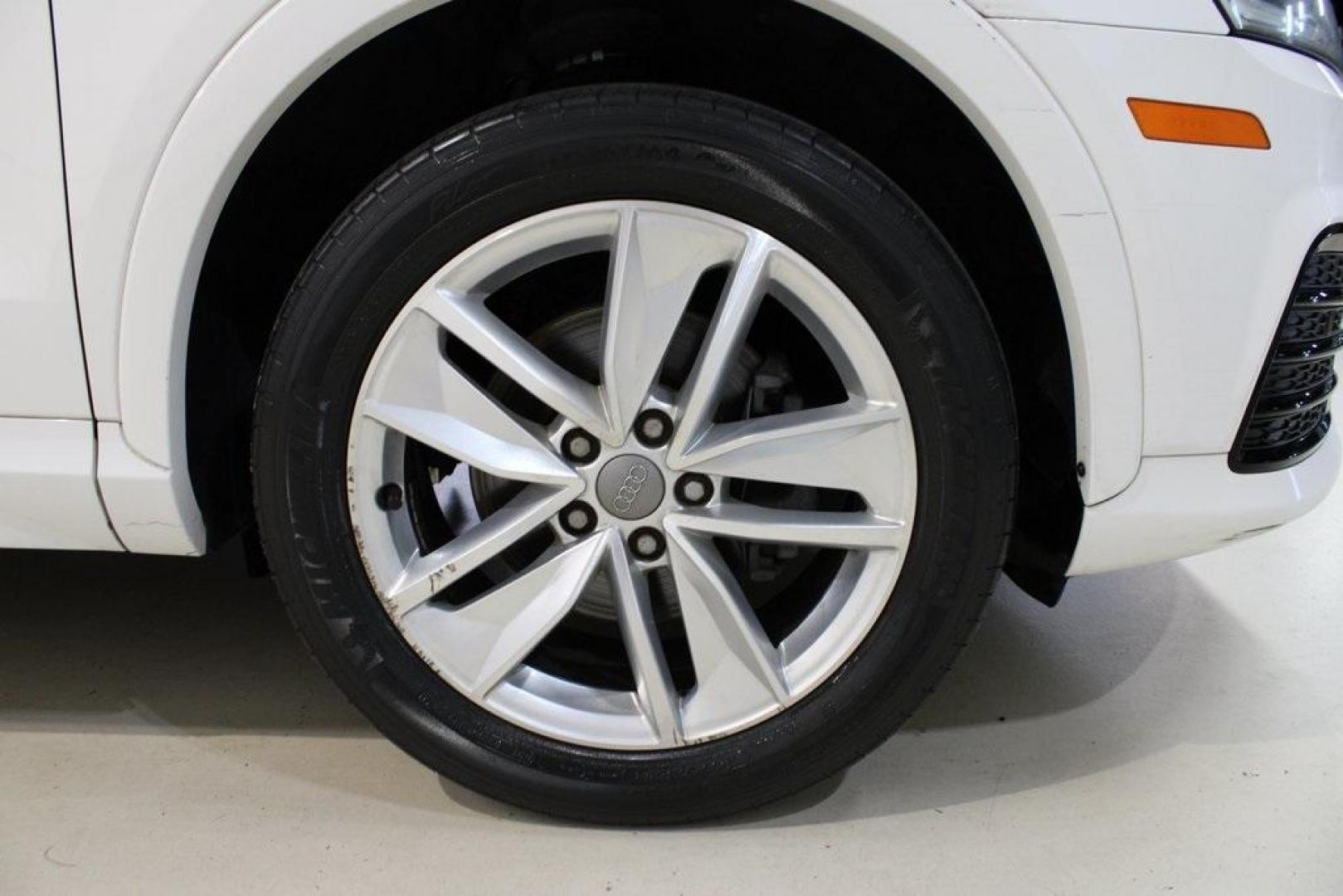 2018 White Audi Q3 2.0T Premium (WA1JCCFS3JR) with an 2.0L 4-Cylinder TFSI engine, Automatic transmission, located at 15300 Midway Rd., Addison, TX, 75001, (972) 702-0011, 32.958321, -96.838074 - 2018 Audi Q3 Premium Plus<br>Now Available at Midway Auto Group Addison, Texas<br><br>Luxury meets agility in the 2018 Audi Q3 Premium Plus a compact SUV that delivers upscale comfort, sharp handling, and Audi's signature design. Perfectly sized for urban driving yet equipped for weekend getaways, - Photo#7