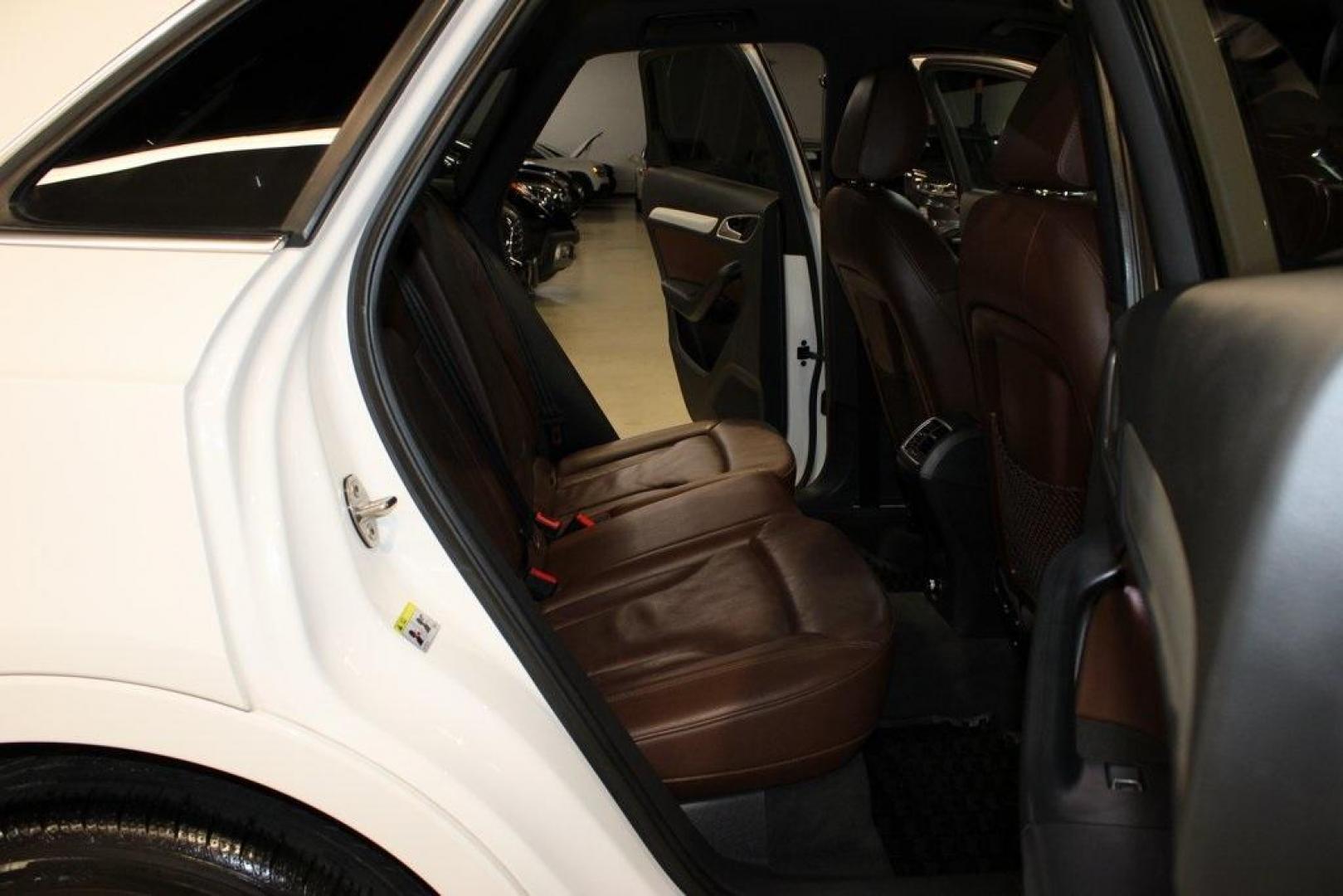 2018 White Audi Q3 2.0T Premium (WA1JCCFS3JR) with an 2.0L 4-Cylinder TFSI engine, Automatic transmission, located at 15300 Midway Rd., Addison, TX, 75001, (972) 702-0011, 32.958321, -96.838074 - 2018 Audi Q3 Premium Plus<br>Now Available at Midway Auto Group Addison, Texas<br><br>Luxury meets agility in the 2018 Audi Q3 Premium Plus a compact SUV that delivers upscale comfort, sharp handling, and Audi's signature design. Perfectly sized for urban driving yet equipped for weekend getaways, - Photo#12