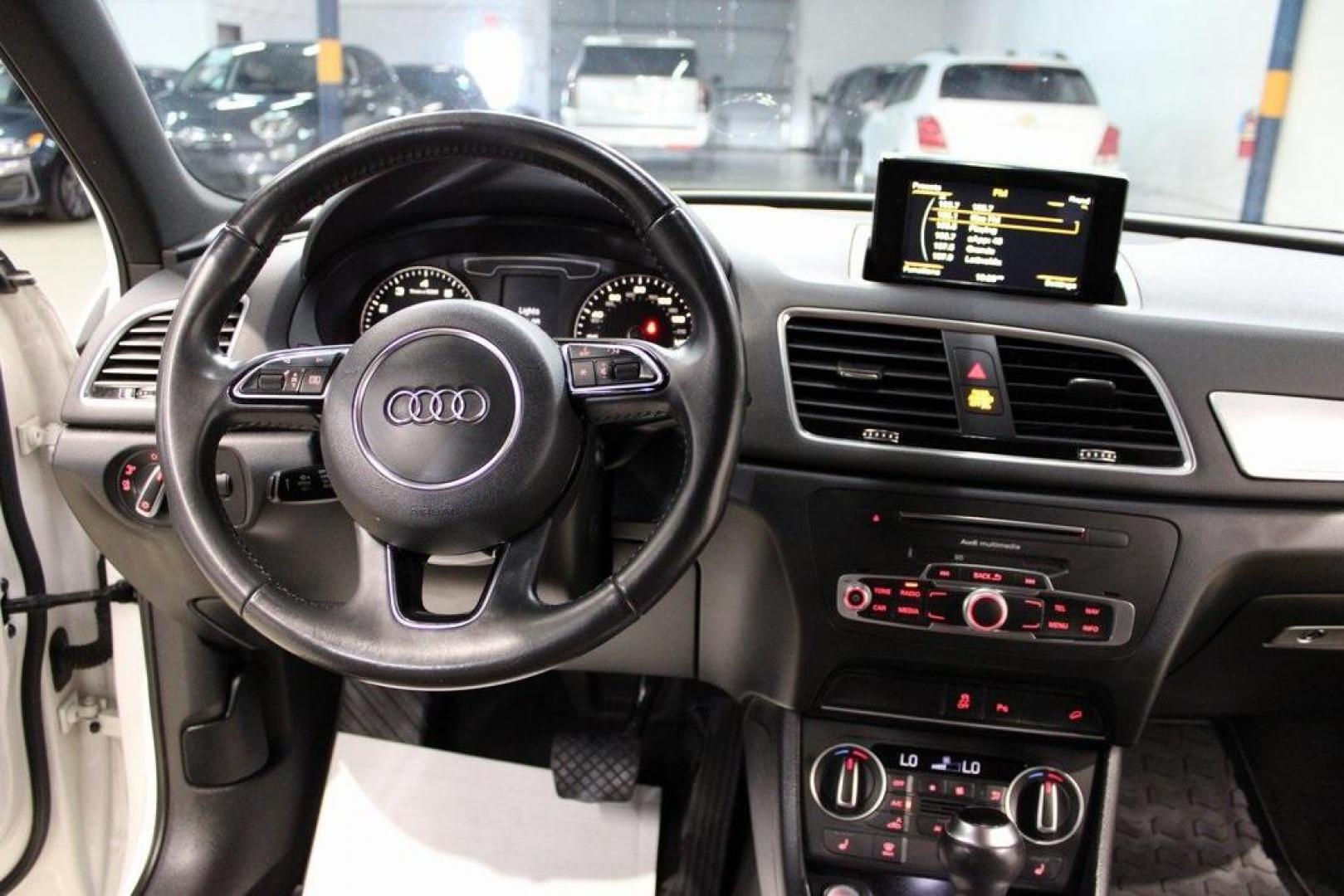 2018 White Audi Q3 2.0T Premium (WA1JCCFS3JR) with an 2.0L 4-Cylinder TFSI engine, Automatic transmission, located at 15300 Midway Rd., Addison, TX, 75001, (972) 702-0011, 32.958321, -96.838074 - 2018 Audi Q3 Premium Plus<br>Now Available at Midway Auto Group Addison, Texas<br><br>Luxury meets agility in the 2018 Audi Q3 Premium Plus a compact SUV that delivers upscale comfort, sharp handling, and Audi's signature design. Perfectly sized for urban driving yet equipped for weekend getaways, - Photo#14
