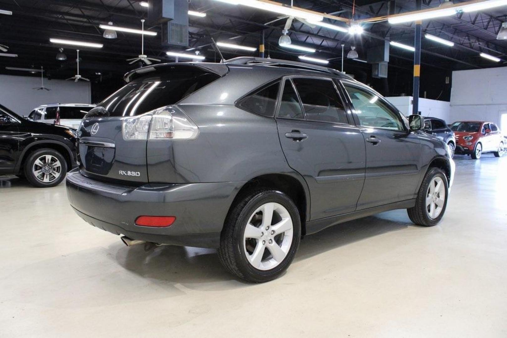 2005 Light Blue /Beige Lexus RX 330 (JTJGA31U850) with an 3.3L V6 SMPI DOHC 24V engine, Automatic transmission, located at 15300 Midway Rd., Addison, TX, 75001, (972) 702-0011, 32.958321, -96.838074 - Photo#2