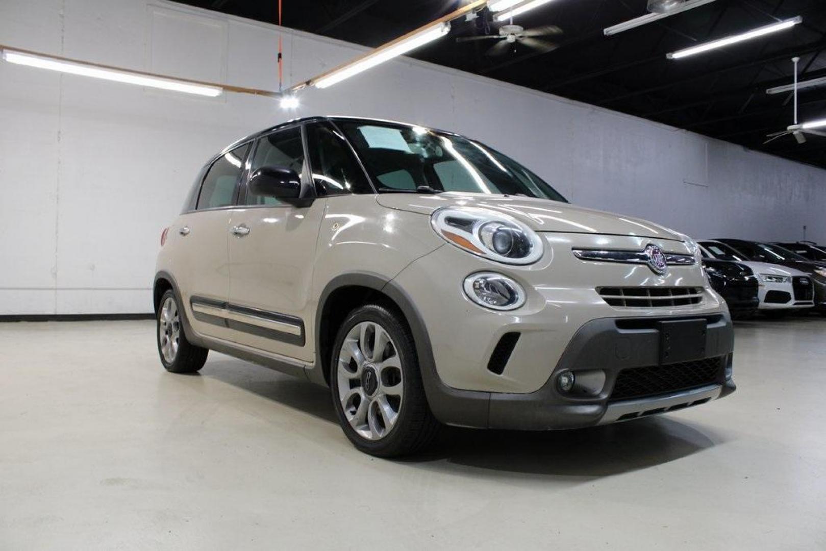 2015 Mocha Latte /Black Fiat 500L Trekking (ZFBCFADH8FZ) with an 1.4L I4 16V MultiAir Turbocharged engine, Automatic transmission, located at 15300 Midway Rd., Addison, TX, 75001, (972) 702-0011, 32.958321, -96.838074 - 2015 FIAT 500L Trekking<br>Now Available at Midway Auto Group Addison, Texas<br><br>Discover big style and versatile functionality with this 2015 FIAT 500L Trekking. Finished in elegant Mocha Latte, it combines spirited turbocharged performance with the modern design and spacious interior you need - Photo#1