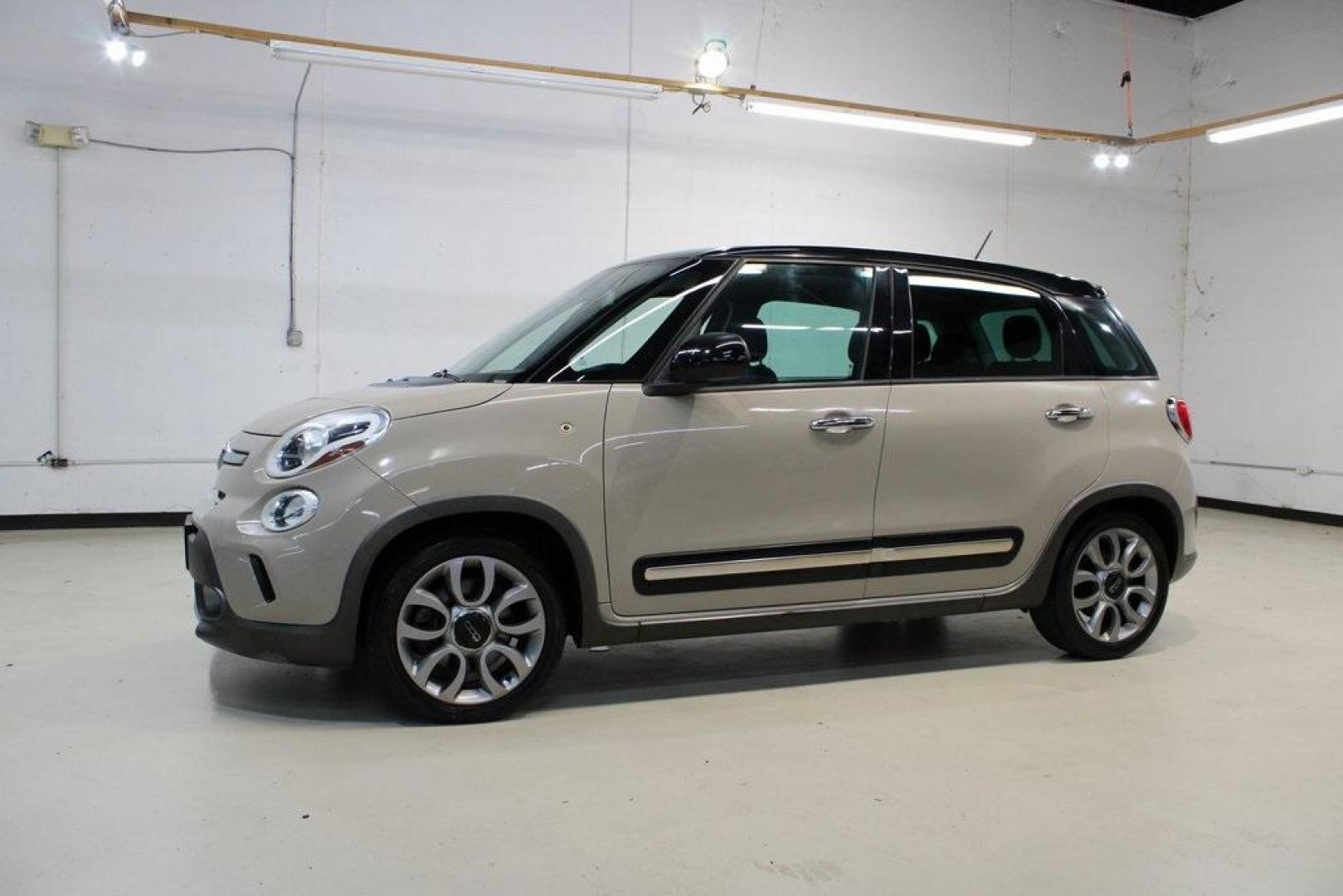 2015 Mocha Latte /Black Fiat 500L Trekking (ZFBCFADH8FZ) with an 1.4L I4 16V MultiAir Turbocharged engine, Automatic transmission, located at 15300 Midway Rd., Addison, TX, 75001, (972) 702-0011, 32.958321, -96.838074 - 2015 FIAT 500L Trekking<br>Now Available at Midway Auto Group Addison, Texas<br><br>Discover big style and versatile functionality with this 2015 FIAT 500L Trekking. Finished in elegant Mocha Latte, it combines spirited turbocharged performance with the modern design and spacious interior you need - Photo#4