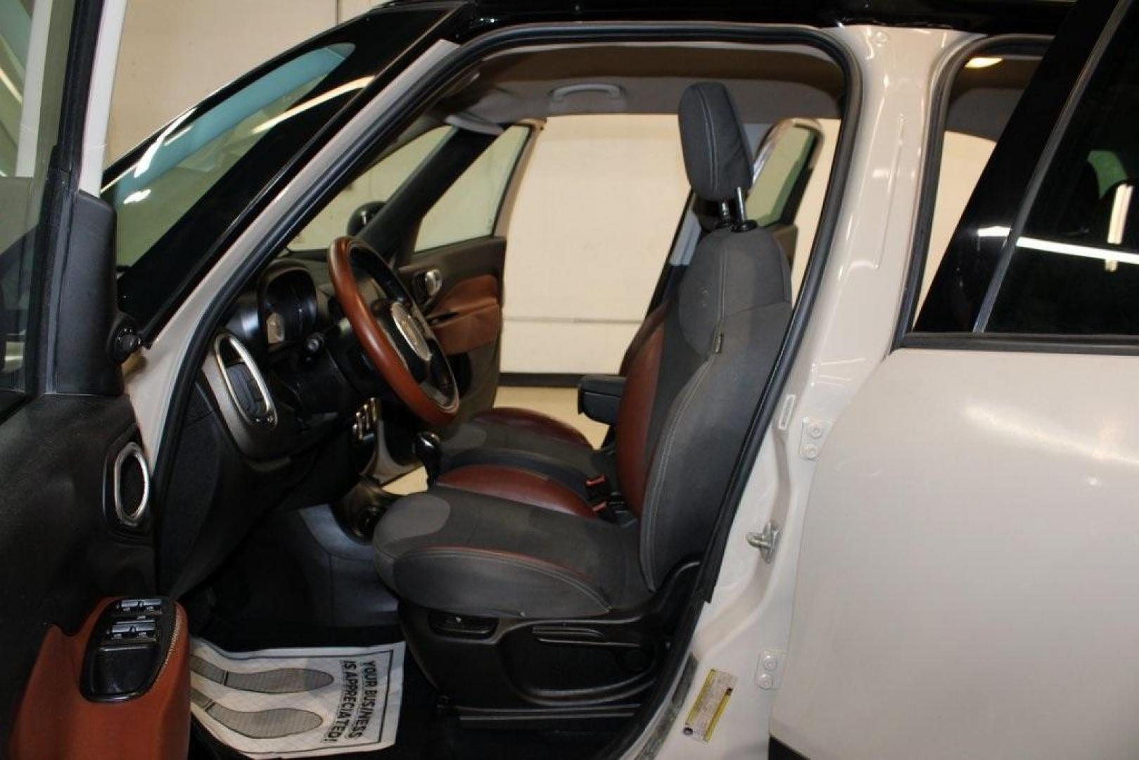 2015 Mocha Latte /Black Fiat 500L Trekking (ZFBCFADH8FZ) with an 1.4L I4 16V MultiAir Turbocharged engine, Automatic transmission, located at 15300 Midway Rd., Addison, TX, 75001, (972) 702-0011, 32.958321, -96.838074 - 2015 FIAT 500L Trekking<br>Now Available at Midway Auto Group Addison, Texas<br><br>Discover big style and versatile functionality with this 2015 FIAT 500L Trekking. Finished in elegant Mocha Latte, it combines spirited turbocharged performance with the modern design and spacious interior you need - Photo#11