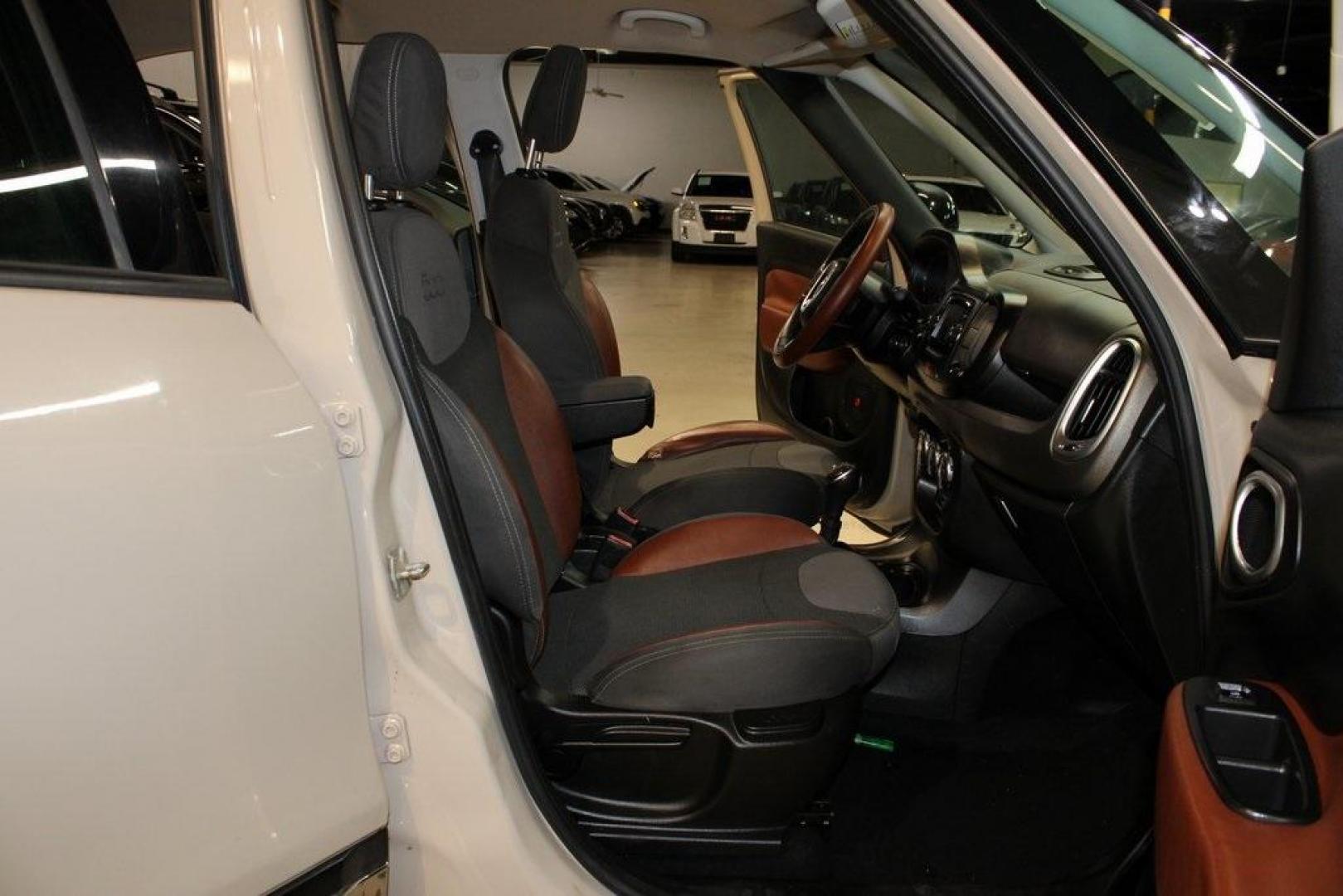 2015 Mocha Latte /Black Fiat 500L Trekking (ZFBCFADH8FZ) with an 1.4L I4 16V MultiAir Turbocharged engine, Automatic transmission, located at 15300 Midway Rd., Addison, TX, 75001, (972) 702-0011, 32.958321, -96.838074 - 2015 FIAT 500L Trekking<br>Now Available at Midway Auto Group Addison, Texas<br><br>Discover big style and versatile functionality with this 2015 FIAT 500L Trekking. Finished in elegant Mocha Latte, it combines spirited turbocharged performance with the modern design and spacious interior you need - Photo#12