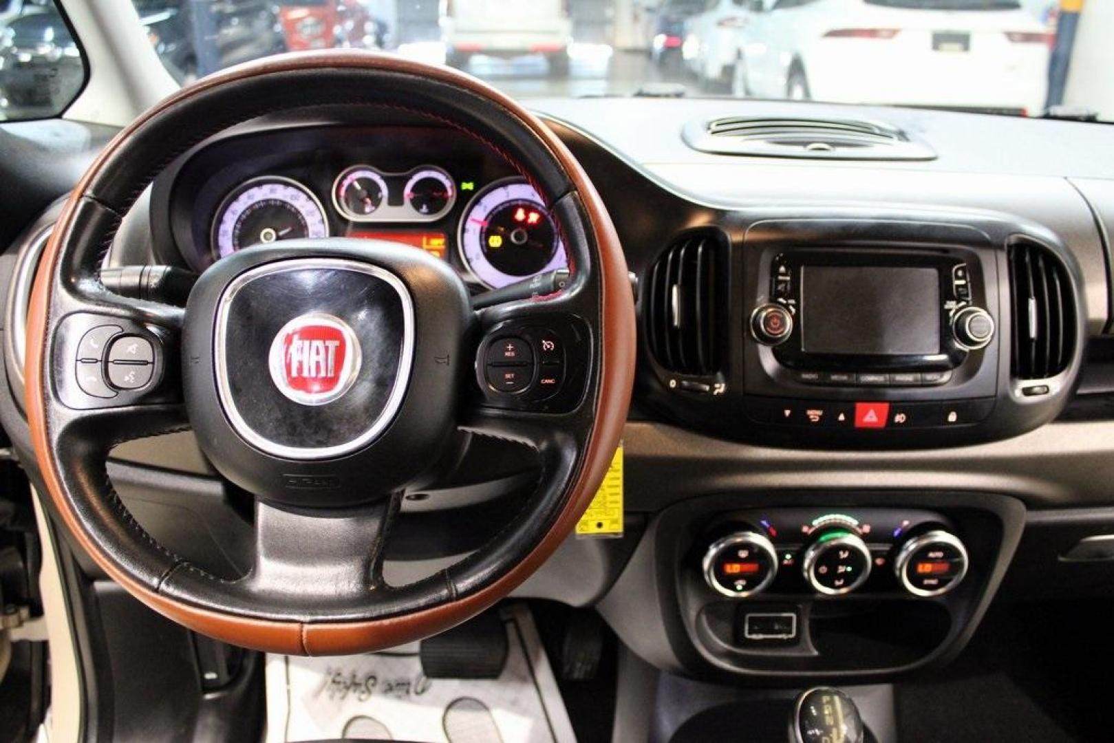 2015 Mocha Latte /Black Fiat 500L Trekking (ZFBCFADH8FZ) with an 1.4L I4 16V MultiAir Turbocharged engine, Automatic transmission, located at 15300 Midway Rd., Addison, TX, 75001, (972) 702-0011, 32.958321, -96.838074 - 2015 FIAT 500L Trekking<br>Now Available at Midway Auto Group Addison, Texas<br><br>Discover big style and versatile functionality with this 2015 FIAT 500L Trekking. Finished in elegant Mocha Latte, it combines spirited turbocharged performance with the modern design and spacious interior you need - Photo#14