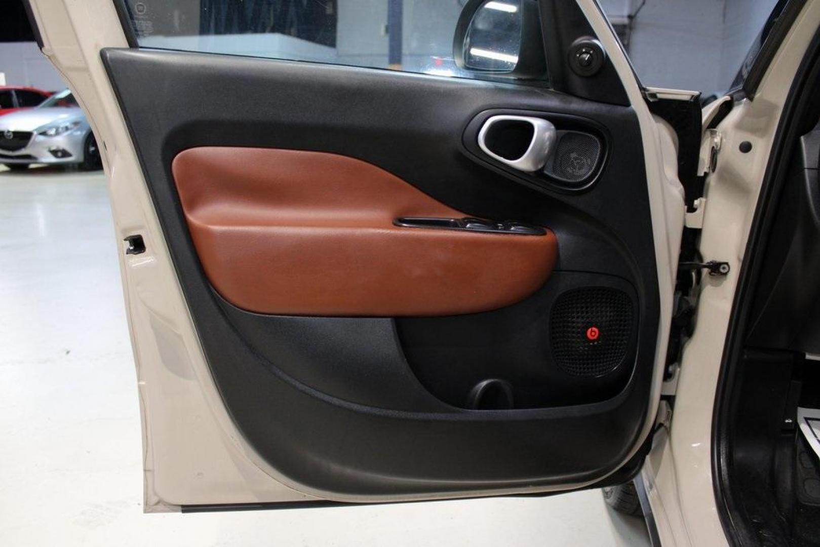 2015 Mocha Latte /Black Fiat 500L Trekking (ZFBCFADH8FZ) with an 1.4L I4 16V MultiAir Turbocharged engine, Automatic transmission, located at 15300 Midway Rd., Addison, TX, 75001, (972) 702-0011, 32.958321, -96.838074 - 2015 FIAT 500L Trekking<br>Now Available at Midway Auto Group Addison, Texas<br><br>Discover big style and versatile functionality with this 2015 FIAT 500L Trekking. Finished in elegant Mocha Latte, it combines spirited turbocharged performance with the modern design and spacious interior you need - Photo#21