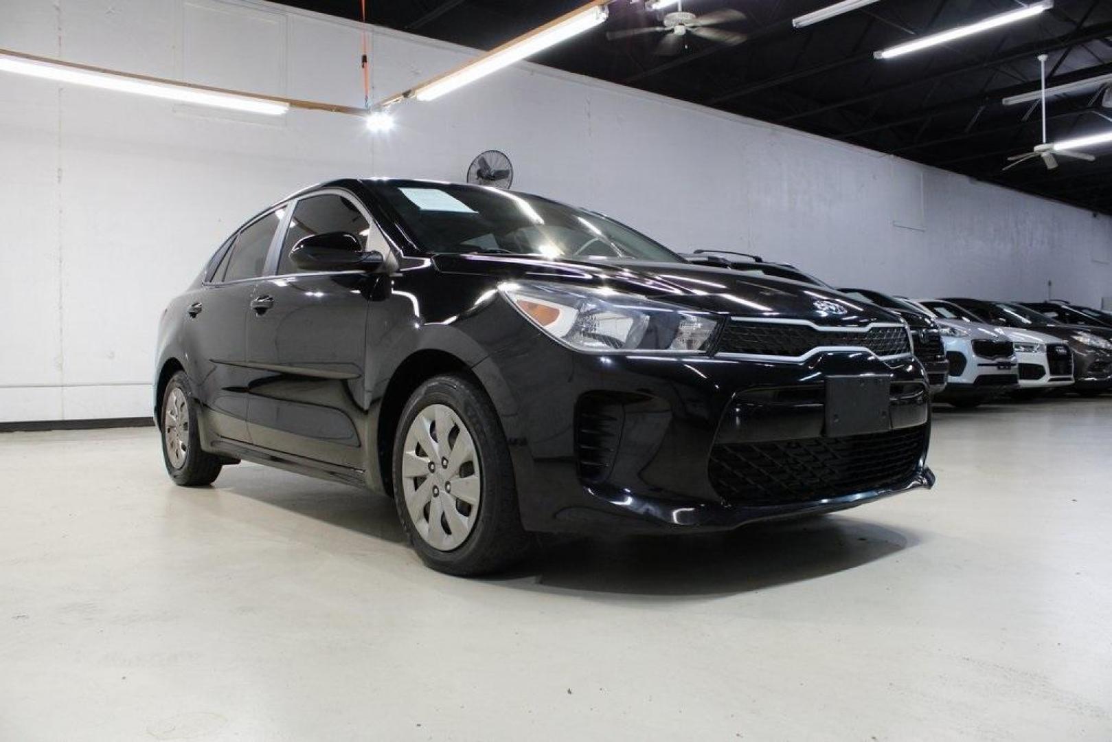 2020 Aurora Black /Black Kia Rio S (3KPA24AD8LE) with an 1.6L 4-Cylinder engine, CVT transmission, located at 15300 Midway Rd., Addison, TX, 75001, (972) 702-0011, 32.958321, -96.838074 - 2020 Kia Rio S<br>Now Available at Midway Auto Group Addison, Texas<br><br>Efficient, modern, and perfectly sized for city life this 2020 Kia Rio S is the ideal compact sedan for savvy drivers in the DallasFort Worth area. Combining excellent fuel economy with user-friendly tech and a comfortable i - Photo#1