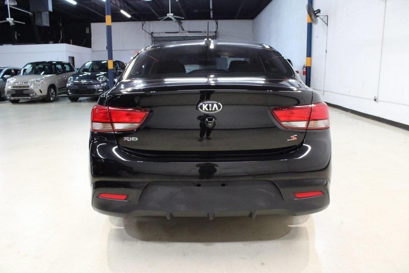 2020 Aurora Black /Black Kia Rio S (3KPA24AD8LE) with an 1.6L 4-Cylinder engine, CVT transmission, located at 15300 Midway Rd., Addison, TX, 75001, (972) 702-0011, 32.958321, -96.838074 - 2020 Kia Rio S<br>Now Available at Midway Auto Group Addison, Texas<br><br>Efficient, modern, and perfectly sized for city life this 2020 Kia Rio S is the ideal compact sedan for savvy drivers in the DallasFort Worth area. Combining excellent fuel economy with user-friendly tech and a comfortable i - Photo#6