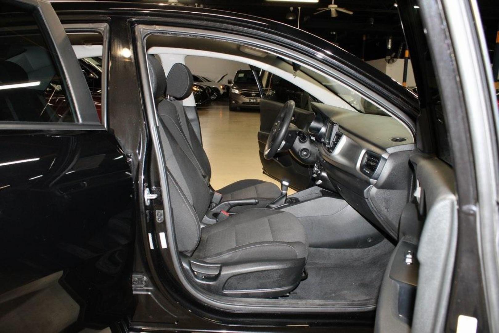 2020 Aurora Black /Black Kia Rio S (3KPA24AD8LE) with an 1.6L 4-Cylinder engine, CVT transmission, located at 15300 Midway Rd., Addison, TX, 75001, (972) 702-0011, 32.958321, -96.838074 - 2020 Kia Rio S<br>Now Available at Midway Auto Group Addison, Texas<br><br>Efficient, modern, and perfectly sized for city life this 2020 Kia Rio S is the ideal compact sedan for savvy drivers in the DallasFort Worth area. Combining excellent fuel economy with user-friendly tech and a comfortable i - Photo#12