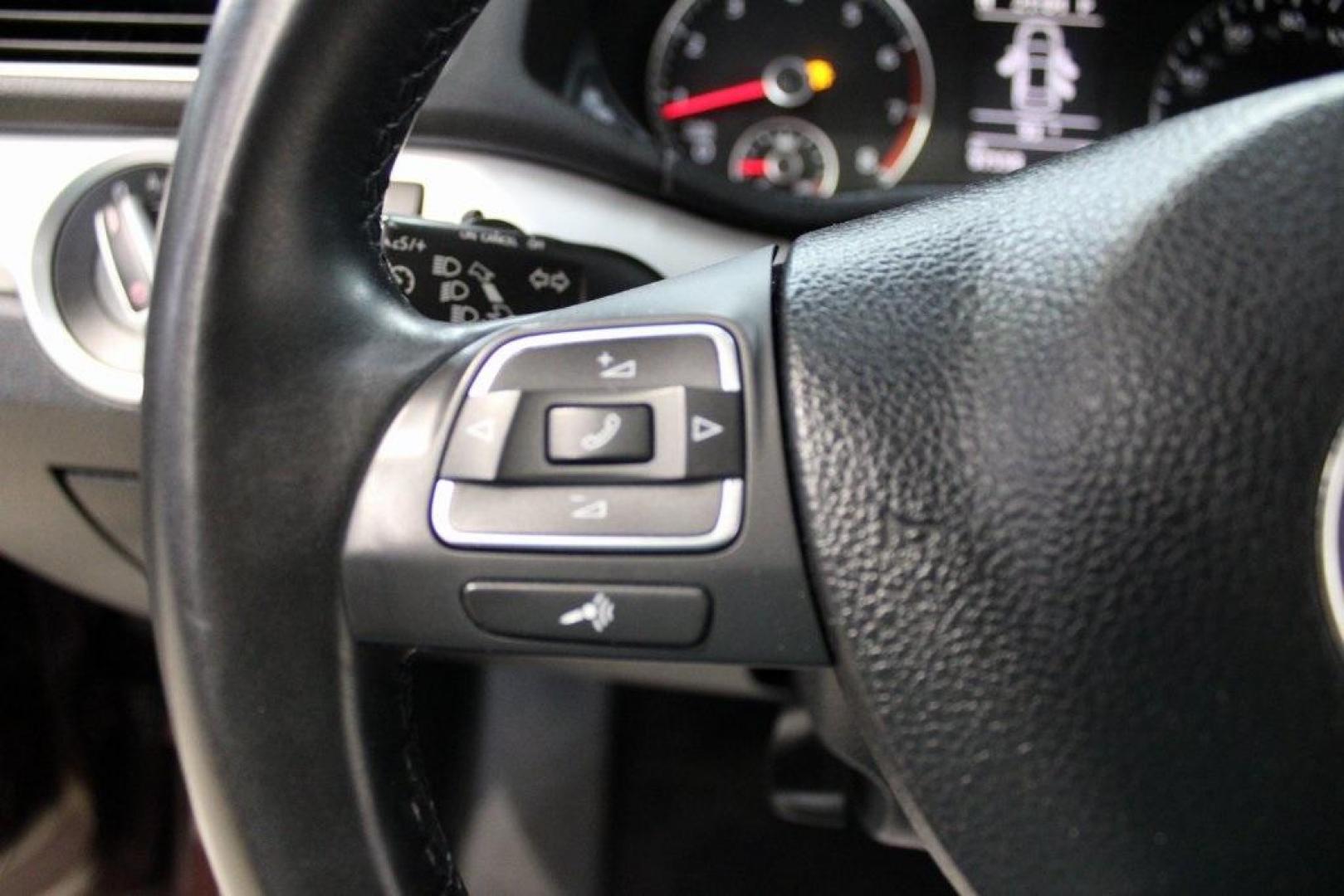 2013 OPERA RED METALLIC /Titan Black Volkswagen Passat 2.5 SE (1VWBH7A39DC) with an 2.5L 5-Cylinder DOHC engine, Automatic transmission, located at 15300 Midway Rd., Addison, TX, 75001, (972) 702-0011, 32.958321, -96.838074 - HOME OF THE NO HAGGLE PRICE - WHOLESALE PRICES TO THE PUBLIC!! Odometer is 27352 miles below market average!<br><br>OPERA RED METALLIC 2013 Volkswagen Passat 2.5 SE<br><br>22/31 City/Highway MPG<br><br>Awards:<br> * 2013 KBB.com 10 Best New Sedans Under $25,000 * 2013 KBB.com 10 Best Family Cars< - Photo#17