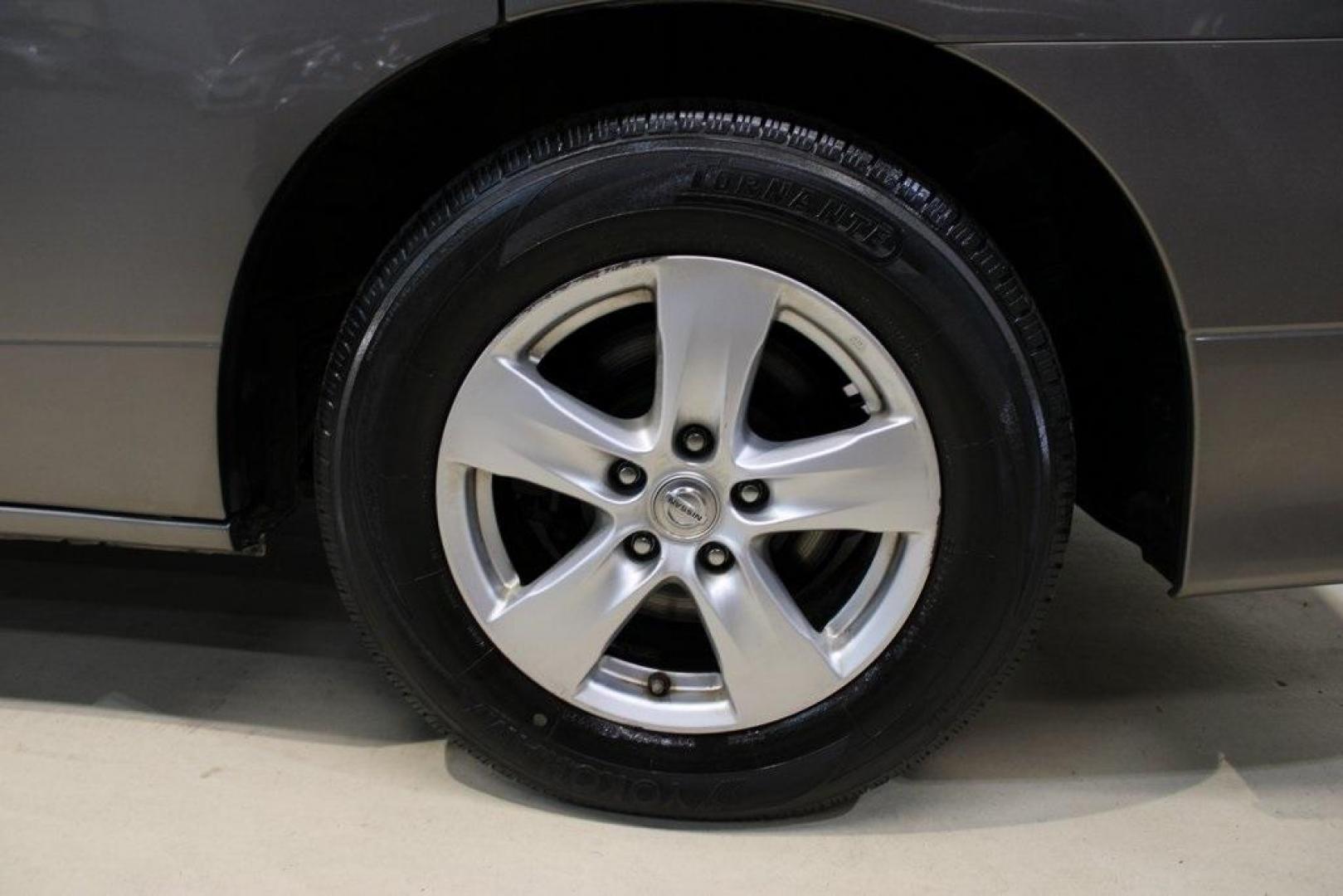 2015 Titanium /Gray Nissan Quest 3.5 SV (JN8AE2KP3F9) with an 3.5L 6-Cylinder DOHC engine, CVT transmission, located at 15300 Midway Rd., Addison, TX, 75001, (972) 702-0011, 32.958321, -96.838074 - 2015 Nissan Quest 3.5 SV<br>Now Available at Midway Auto Group Addison, Texas<br><br>Spacious, refined, and thoughtfully designed, the 2015 Nissan Quest 3.5SV offers premium minivan comfort at a competitive value. Ideal for families or daily drivers, it combines performance, advanced safety, and ve - Photo#9