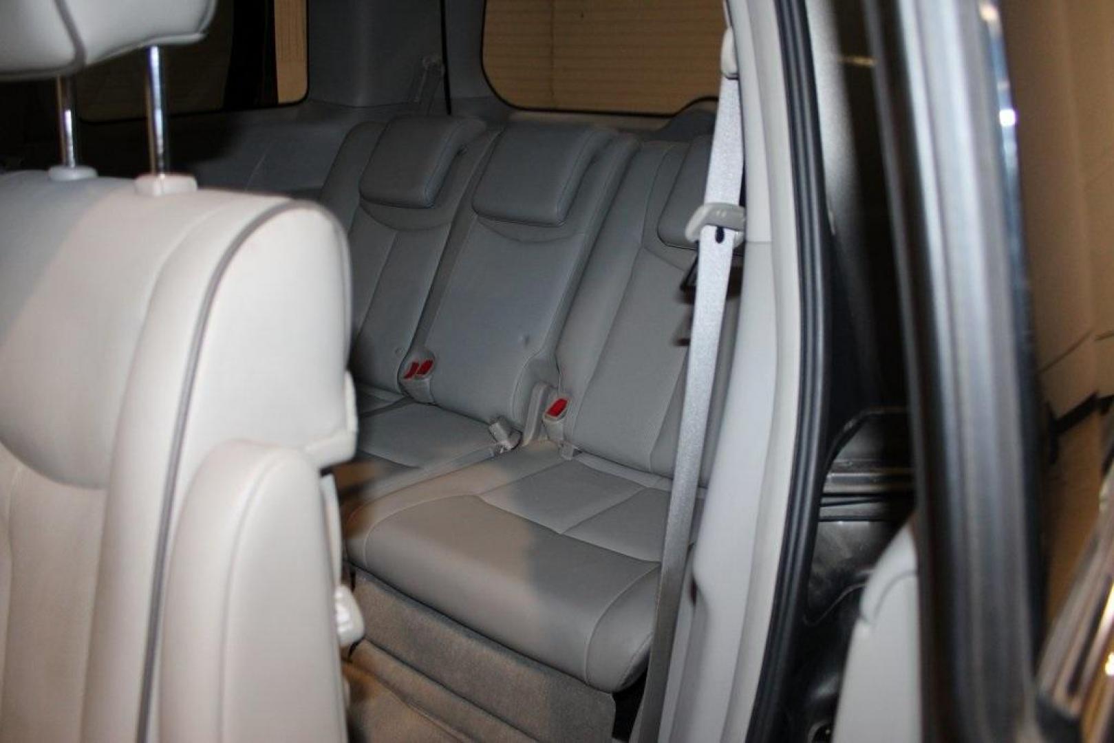2015 Titanium /Gray Nissan Quest 3.5 SV (JN8AE2KP3F9) with an 3.5L 6-Cylinder DOHC engine, CVT transmission, located at 15300 Midway Rd., Addison, TX, 75001, (972) 702-0011, 32.958321, -96.838074 - 2015 Nissan Quest 3.5 SV<br>Now Available at Midway Auto Group Addison, Texas<br><br>Spacious, refined, and thoughtfully designed, the 2015 Nissan Quest 3.5SV offers premium minivan comfort at a competitive value. Ideal for families or daily drivers, it combines performance, advanced safety, and ve - Photo#16