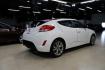 2016 Century White /Black Hyundai Veloster Base (KMHTC6AD4GU) with an 1.6L I4 DGI DOHC 16V ULEV II 132hp engine, Automatic transmission, located at 15300 Midway Rd., Addison, TX, 75001, (972) 702-0011, 32.958321, -96.838074 - 2016 Hyundai Veloster Base<br>Now Available at Midway Auto Group Addison, Texas<br><br>Sporty, efficient, and full of character, this 2016 Hyundai Veloster Base brings compact utility and fun-factor together seamlessly. With its distinctive 3-door hatchback design, confident performance, and modern - Photo#2