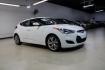 2016 Century White /Black Hyundai Veloster Base (KMHTC6AD4GU) with an 1.6L I4 DGI DOHC 16V ULEV II 132hp engine, Automatic transmission, located at 15300 Midway Rd., Addison, TX, 75001, (972) 702-0011, 32.958321, -96.838074 - 2016 Hyundai Veloster Base<br>Now Available at Midway Auto Group Addison, Texas<br><br>Sporty, efficient, and full of character, this 2016 Hyundai Veloster Base brings compact utility and fun-factor together seamlessly. With its distinctive 3-door hatchback design, confident performance, and modern - Photo#6