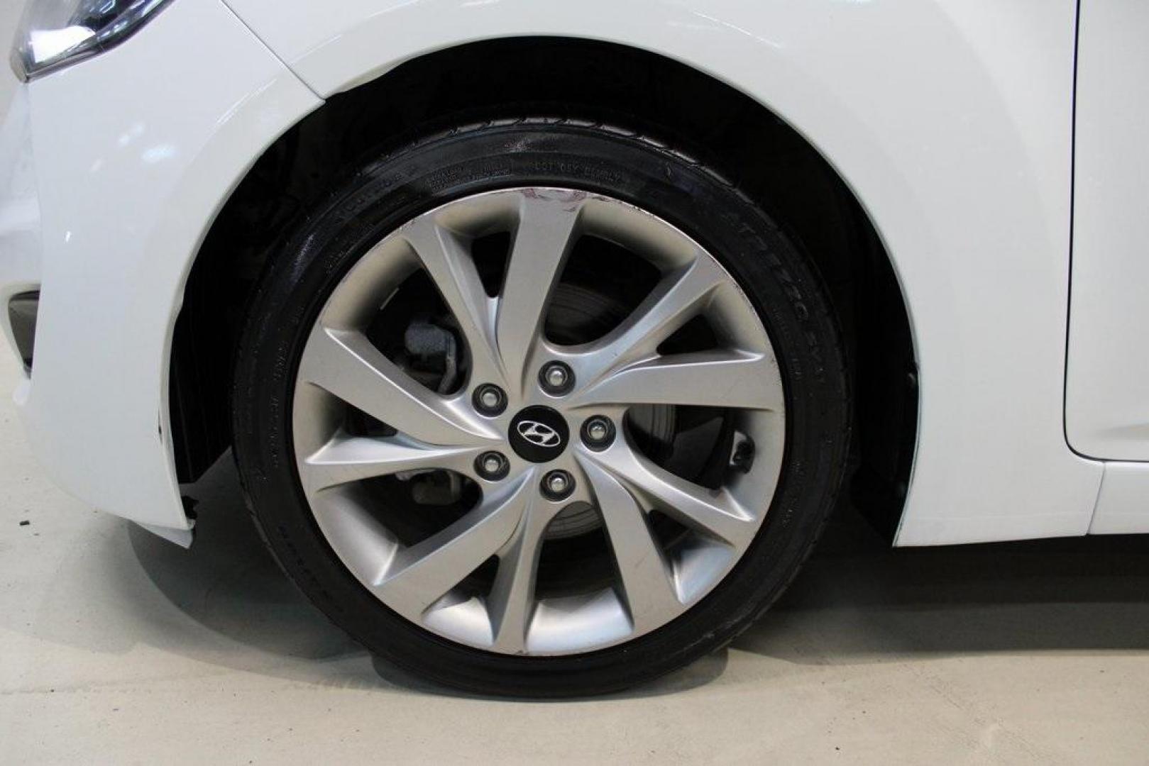 2016 Century White /Black Hyundai Veloster Base (KMHTC6AD4GU) with an 1.6L I4 DGI DOHC 16V ULEV II 132hp engine, Automatic transmission, located at 15300 Midway Rd., Addison, TX, 75001, (972) 702-0011, 32.958321, -96.838074 - 2016 Hyundai Veloster Base<br>Now Available at Midway Auto Group Addison, Texas<br><br>Sporty, efficient, and full of character, this 2016 Hyundai Veloster Base brings compact utility and fun-factor together seamlessly. With its distinctive 3-door hatchback design, confident performance, and modern - Photo#8