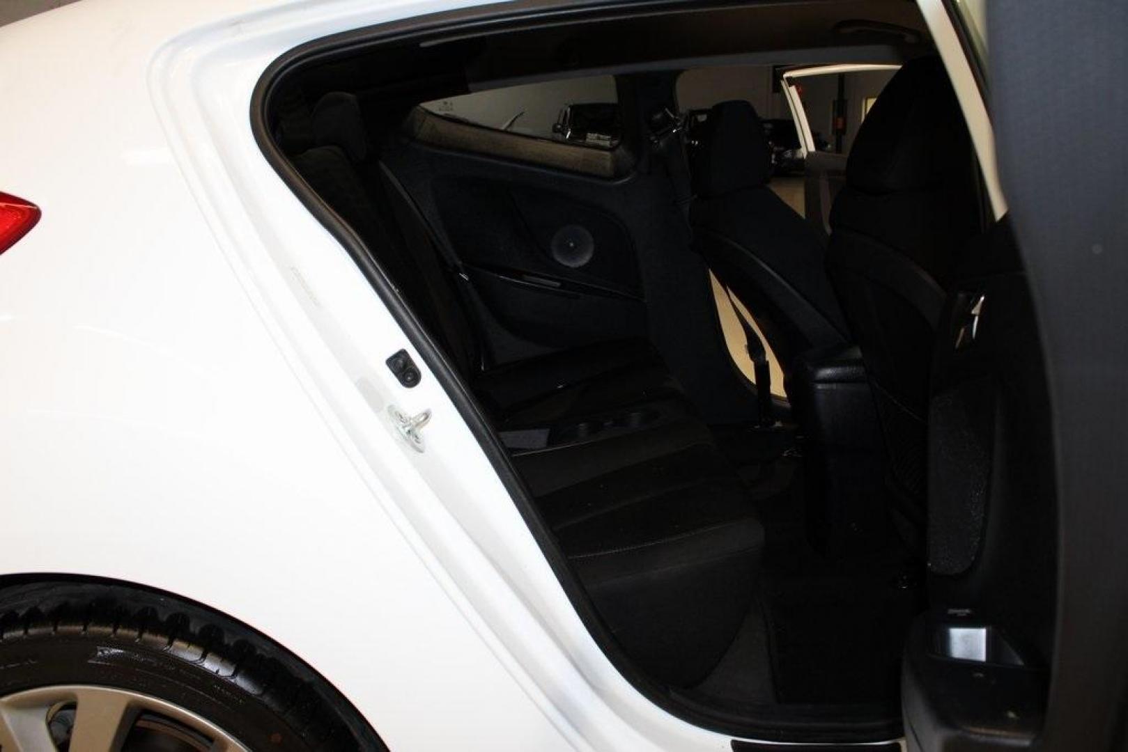 2016 Century White /Black Hyundai Veloster Base (KMHTC6AD4GU) with an 1.6L I4 DGI DOHC 16V ULEV II 132hp engine, Automatic transmission, located at 15300 Midway Rd., Addison, TX, 75001, (972) 702-0011, 32.958321, -96.838074 - 2016 Hyundai Veloster Base<br>Now Available at Midway Auto Group Addison, Texas<br><br>Sporty, efficient, and full of character, this 2016 Hyundai Veloster Base brings compact utility and fun-factor together seamlessly. With its distinctive 3-door hatchback design, confident performance, and modern - Photo#14