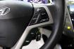 2016 Century White /Black Hyundai Veloster Base (KMHTC6AD4GU) with an 1.6L I4 DGI DOHC 16V ULEV II 132hp engine, Automatic transmission, located at 15300 Midway Rd., Addison, TX, 75001, (972) 702-0011, 32.958321, -96.838074 - 2016 Hyundai Veloster Base<br>Now Available at Midway Auto Group Addison, Texas<br><br>Sporty, efficient, and full of character, this 2016 Hyundai Veloster Base brings compact utility and fun-factor together seamlessly. With its distinctive 3-door hatchback design, confident performance, and modern - Photo#20