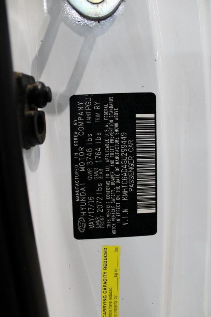 2016 Century White /Black Hyundai Veloster Base (KMHTC6AD4GU) with an 1.6L I4 DGI DOHC 16V ULEV II 132hp engine, Automatic transmission, located at 15300 Midway Rd., Addison, TX, 75001, (972) 702-0011, 32.958321, -96.838074 - 2016 Hyundai Veloster Base<br>Now Available at Midway Auto Group Addison, Texas<br><br>Sporty, efficient, and full of character, this 2016 Hyundai Veloster Base brings compact utility and fun-factor together seamlessly. With its distinctive 3-door hatchback design, confident performance, and modern - Photo#24