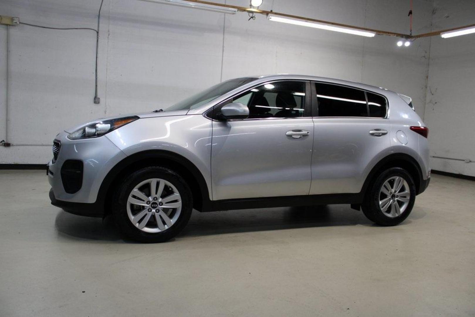 2019 Sparkling Silver /Black Kia Sportage LX (KNDPM3ACXK7) with an 2.4L I4 DGI DOHC 16V engine, Automatic transmission, located at 15300 Midway Rd., Addison, TX, 75001, (972) 702-0011, 32.958321, -96.838074 - 2019 Kia Sportage LX<br>Now Available at Midway Auto Group Addison, Texas<br><br>Reliable, modern, and built for comfort the 2019 Kia Sportage LX delivers confident performance, everyday practicality, and a suite of intuitive features. With its spacious interior and versatile capabilities, this com - Photo#5