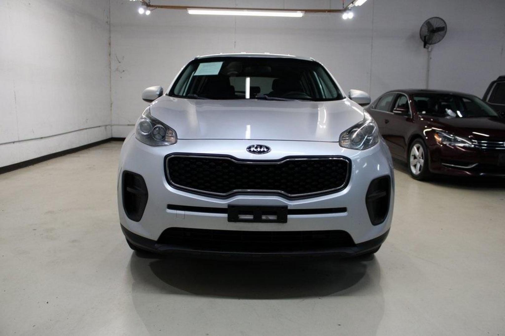 2019 Sparkling Silver /Black Kia Sportage LX (KNDPM3ACXK7) with an 2.4L I4 DGI DOHC 16V engine, Automatic transmission, located at 15300 Midway Rd., Addison, TX, 75001, (972) 702-0011, 32.958321, -96.838074 - 2019 Kia Sportage LX<br>Now Available at Midway Auto Group Addison, Texas<br><br>Reliable, modern, and built for comfort the 2019 Kia Sportage LX delivers confident performance, everyday practicality, and a suite of intuitive features. With its spacious interior and versatile capabilities, this com - Photo#6