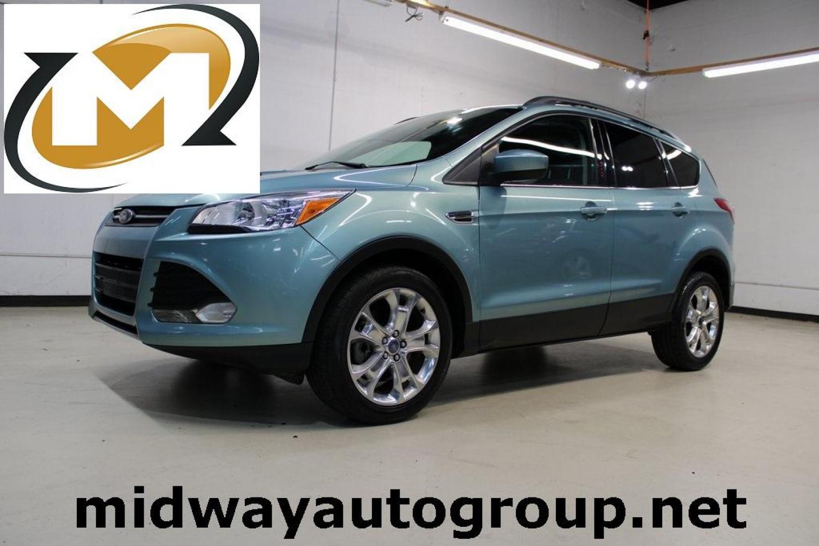 2013 Frosted Glass Metallic /Black Ford Escape SE (1FMCU9GX0DU) with an EcoBoost 1.6L I4 GTDi DOHC Turbocharged VCT engine, Automatic transmission, located at 15300 Midway Rd., Addison, TX, 75001, (972) 702-0011, 32.958321, -96.838074 - Photo#0