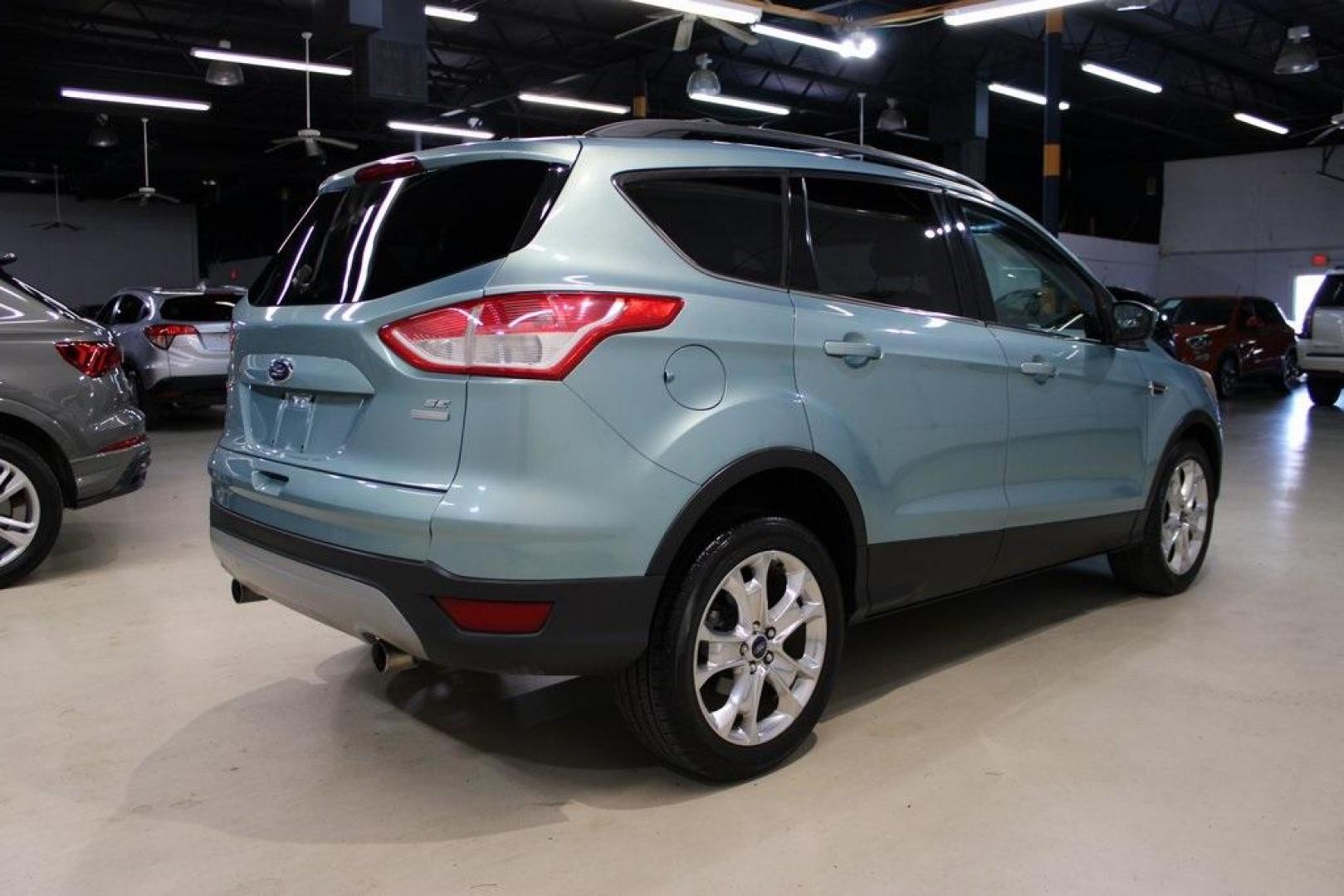 2013 Frosted Glass Metallic /Black Ford Escape SE (1FMCU9GX0DU) with an EcoBoost 1.6L I4 GTDi DOHC Turbocharged VCT engine, Automatic transmission, located at 15300 Midway Rd., Addison, TX, 75001, (972) 702-0011, 32.958321, -96.838074 - Photo#3