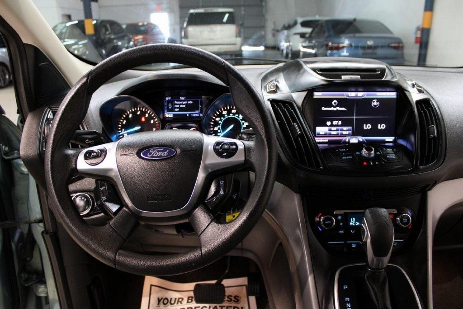 2013 Frosted Glass Metallic /Black Ford Escape SE (1FMCU9GX0DU) with an EcoBoost 1.6L I4 GTDi DOHC Turbocharged VCT engine, Automatic transmission, located at 15300 Midway Rd., Addison, TX, 75001, (972) 702-0011, 32.958321, -96.838074 - Photo#16