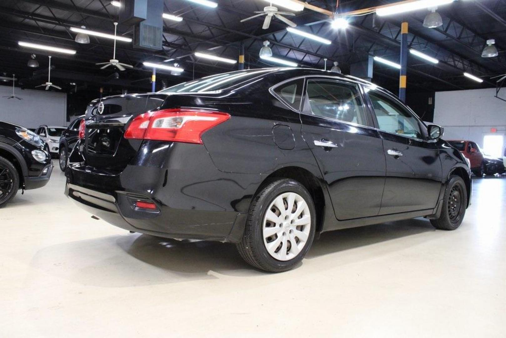 2017 Super Black /Charcoal Nissan Sentra S (3N1AB7AP1HY) with an 1.8L 4-Cylinder DOHC 16V engine, CVT transmission, located at 15300 Midway Rd., Addison, TX, 75001, (972) 702-0011, 32.958321, -96.838074 - 2017 Nissan Sentra S<br>Now Available at Midway Auto Group Addison, Texas<br><br>Efficient, dependable, and comfortablethe 2017 Nissan Sentra S is the perfect choice for daily commuting or weekend travel. Offering a spacious interior, excellent fuel economy, and modern convenience features, this se - Photo#2