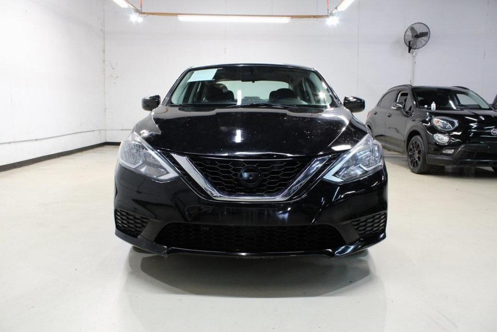 2017 Super Black /Charcoal Nissan Sentra S (3N1AB7AP1HY) with an 1.8L 4-Cylinder DOHC 16V engine, CVT transmission, located at 15300 Midway Rd., Addison, TX, 75001, (972) 702-0011, 32.958321, -96.838074 - 2017 Nissan Sentra S<br>Now Available at Midway Auto Group Addison, Texas<br><br>Efficient, dependable, and comfortablethe 2017 Nissan Sentra S is the perfect choice for daily commuting or weekend travel. Offering a spacious interior, excellent fuel economy, and modern convenience features, this se - Photo#5