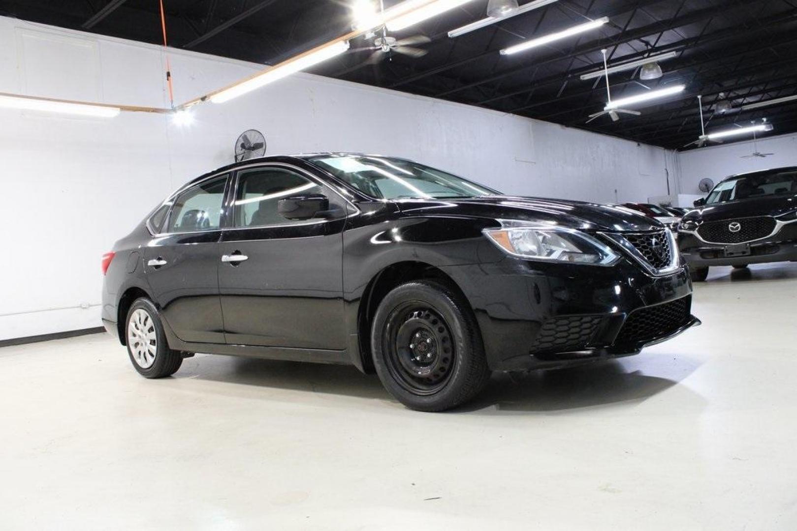 2017 Super Black /Charcoal Nissan Sentra S (3N1AB7AP1HY) with an 1.8L 4-Cylinder DOHC 16V engine, CVT transmission, located at 15300 Midway Rd., Addison, TX, 75001, (972) 702-0011, 32.958321, -96.838074 - 2017 Nissan Sentra S<br>Now Available at Midway Auto Group Addison, Texas<br><br>Efficient, dependable, and comfortablethe 2017 Nissan Sentra S is the perfect choice for daily commuting or weekend travel. Offering a spacious interior, excellent fuel economy, and modern convenience features, this se - Photo#6