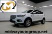 2018 Oxford White /Medium Light Stone Ford Escape SE (1FMCU0G99JU) with an EcoBoost 1.5L I4 GTDi DOHC Turbocharged VCT engine, Automatic transmission, located at 15300 Midway Rd., Addison, TX, 75001, (972) 702-0011, 32.958321, -96.838074 - 2018 Ford Escape SE<br>Now Available at Midway Auto Group Addison, Texas<br><br>The 2018 Ford Escape SE blends sporty style with everyday practicality, making it a top pick for drivers who want comfort, technology, and versatility in a compact SUV. With a turbocharged engine, spacious interior, and - Photo#0