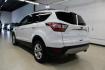 2018 Oxford White /Medium Light Stone Ford Escape SE (1FMCU0G99JU) with an EcoBoost 1.5L I4 GTDi DOHC Turbocharged VCT engine, Automatic transmission, located at 15300 Midway Rd., Addison, TX, 75001, (972) 702-0011, 32.958321, -96.838074 - 2018 Ford Escape SE<br>Now Available at Midway Auto Group Addison, Texas<br><br>The 2018 Ford Escape SE blends sporty style with everyday practicality, making it a top pick for drivers who want comfort, technology, and versatility in a compact SUV. With a turbocharged engine, spacious interior, and - Photo#3