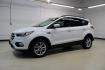 2018 Oxford White /Medium Light Stone Ford Escape SE (1FMCU0G99JU) with an EcoBoost 1.5L I4 GTDi DOHC Turbocharged VCT engine, Automatic transmission, located at 15300 Midway Rd., Addison, TX, 75001, (972) 702-0011, 32.958321, -96.838074 - 2018 Ford Escape SE<br>Now Available at Midway Auto Group Addison, Texas<br><br>The 2018 Ford Escape SE blends sporty style with everyday practicality, making it a top pick for drivers who want comfort, technology, and versatility in a compact SUV. With a turbocharged engine, spacious interior, and - Photo#4