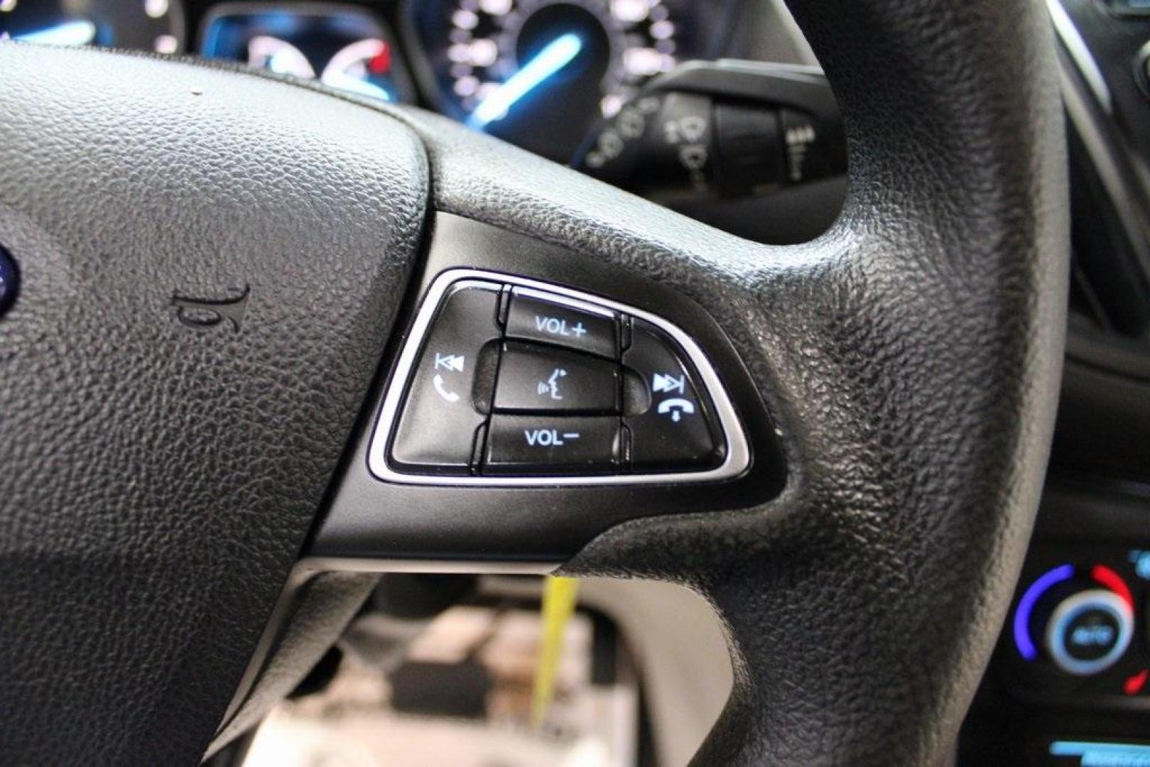 2018 Oxford White /Medium Light Stone Ford Escape SE (1FMCU0G99JU) with an EcoBoost 1.5L I4 GTDi DOHC Turbocharged VCT engine, Automatic transmission, located at 15300 Midway Rd., Addison, TX, 75001, (972) 702-0011, 32.958321, -96.838074 - 2018 Ford Escape SE<br>Now Available at Midway Auto Group Addison, Texas<br><br>The 2018 Ford Escape SE blends sporty style with everyday practicality, making it a top pick for drivers who want comfort, technology, and versatility in a compact SUV. With a turbocharged engine, spacious interior, and - Photo#23