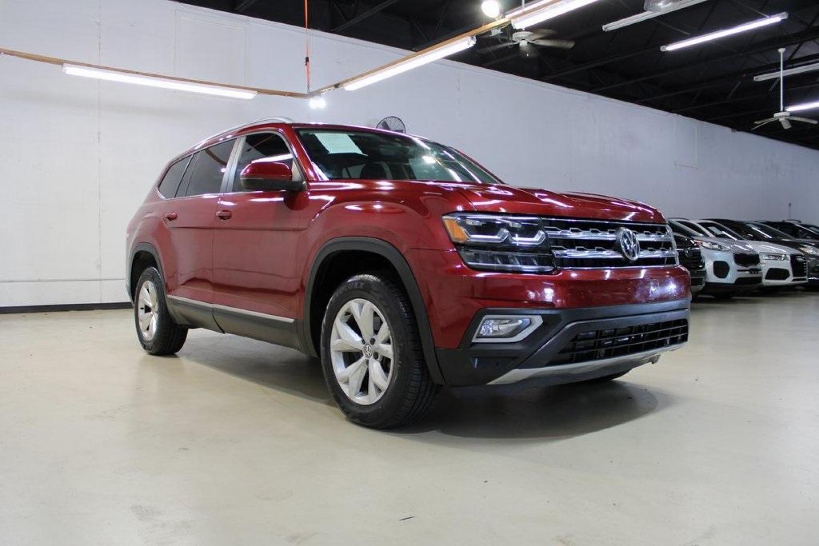 2018 Fortana Red /Titan Black Volkswagen Atlas SEL (1V2ER2CA1JC) with an 3.6L V6 engine, Automatic transmission, located at 15300 Midway Rd., Addison, TX, 75001, (972) 702-0011, 32.958321, -96.838074 - Photo#1
