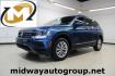 2018 Blue Metallic /Titan Black Volkswagen Tiguan 2.0T SE (3VV3B7AX7JM) with an 2.0L TSI DOHC engine, Automatic transmission, located at 15300 Midway Rd., Addison, TX, 75001, (972) 702-0011, 32.958321, -96.838074 - Photo#0