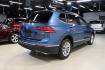 2018 Blue Metallic /Titan Black Volkswagen Tiguan 2.0T SE (3VV3B7AX7JM) with an 2.0L TSI DOHC engine, Automatic transmission, located at 15300 Midway Rd., Addison, TX, 75001, (972) 702-0011, 32.958321, -96.838074 - Photo#1