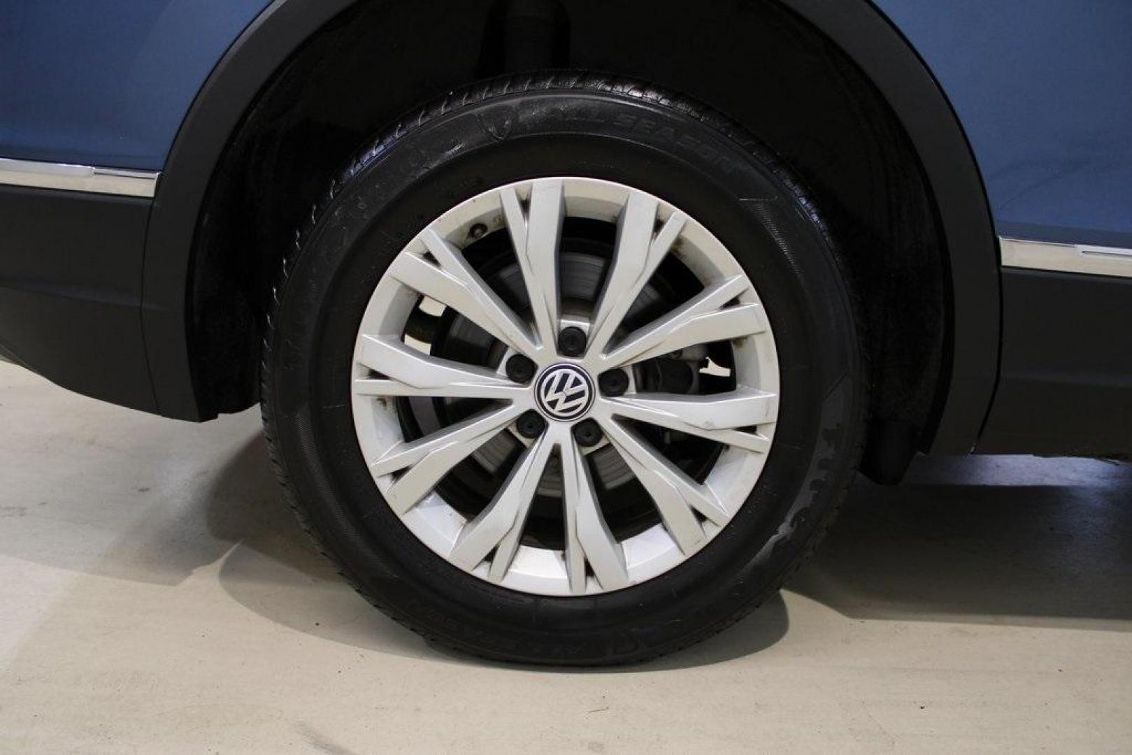 2018 Blue Metallic /Titan Black Volkswagen Tiguan 2.0T SE (3VV3B7AX7JM) with an 2.0L TSI DOHC engine, Automatic transmission, located at 15300 Midway Rd., Addison, TX, 75001, (972) 702-0011, 32.958321, -96.838074 - Photo#6