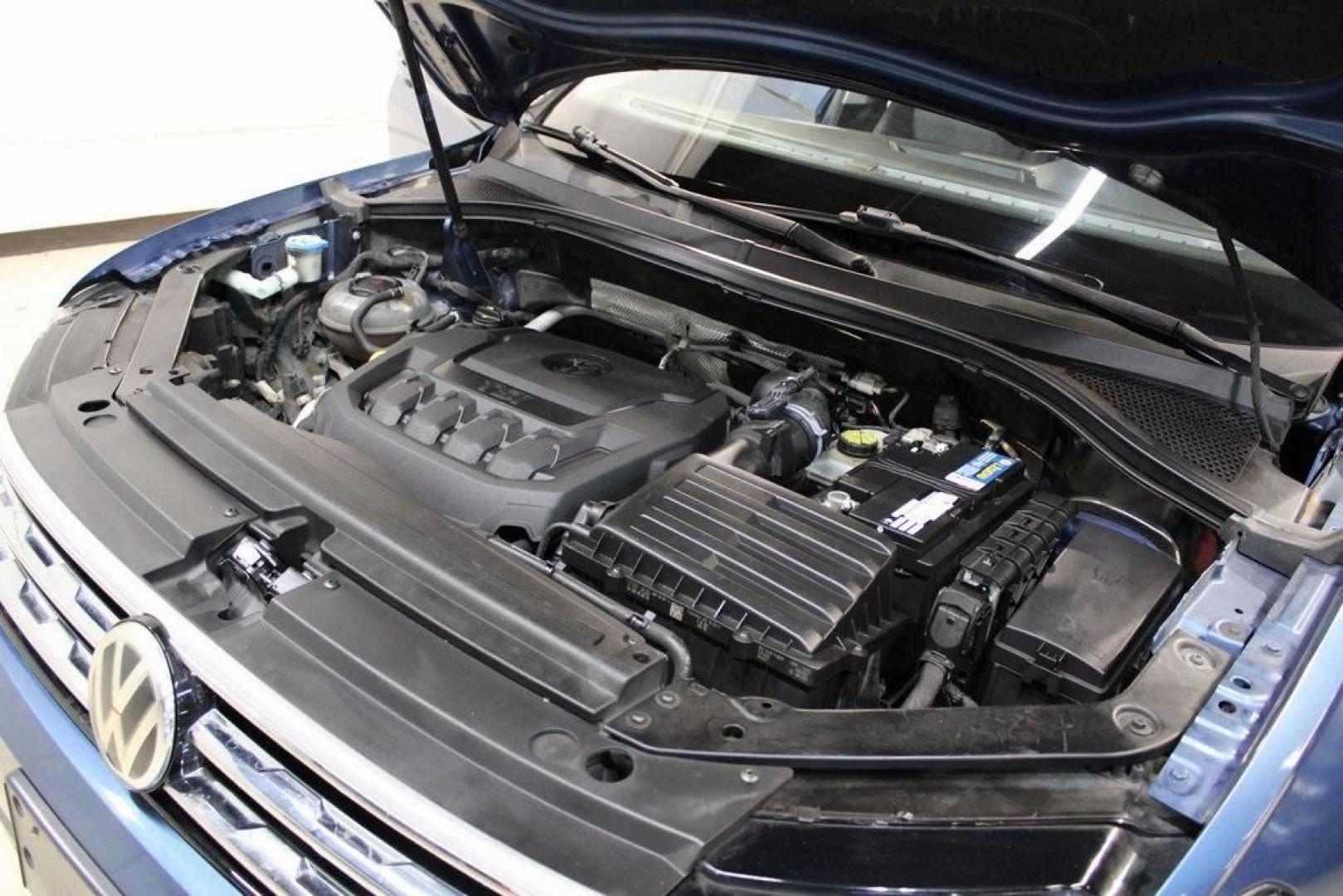 2018 Blue Metallic /Titan Black Volkswagen Tiguan 2.0T SE (3VV3B7AX7JM) with an 2.0L TSI DOHC engine, Automatic transmission, located at 15300 Midway Rd., Addison, TX, 75001, (972) 702-0011, 32.958321, -96.838074 - Photo#24