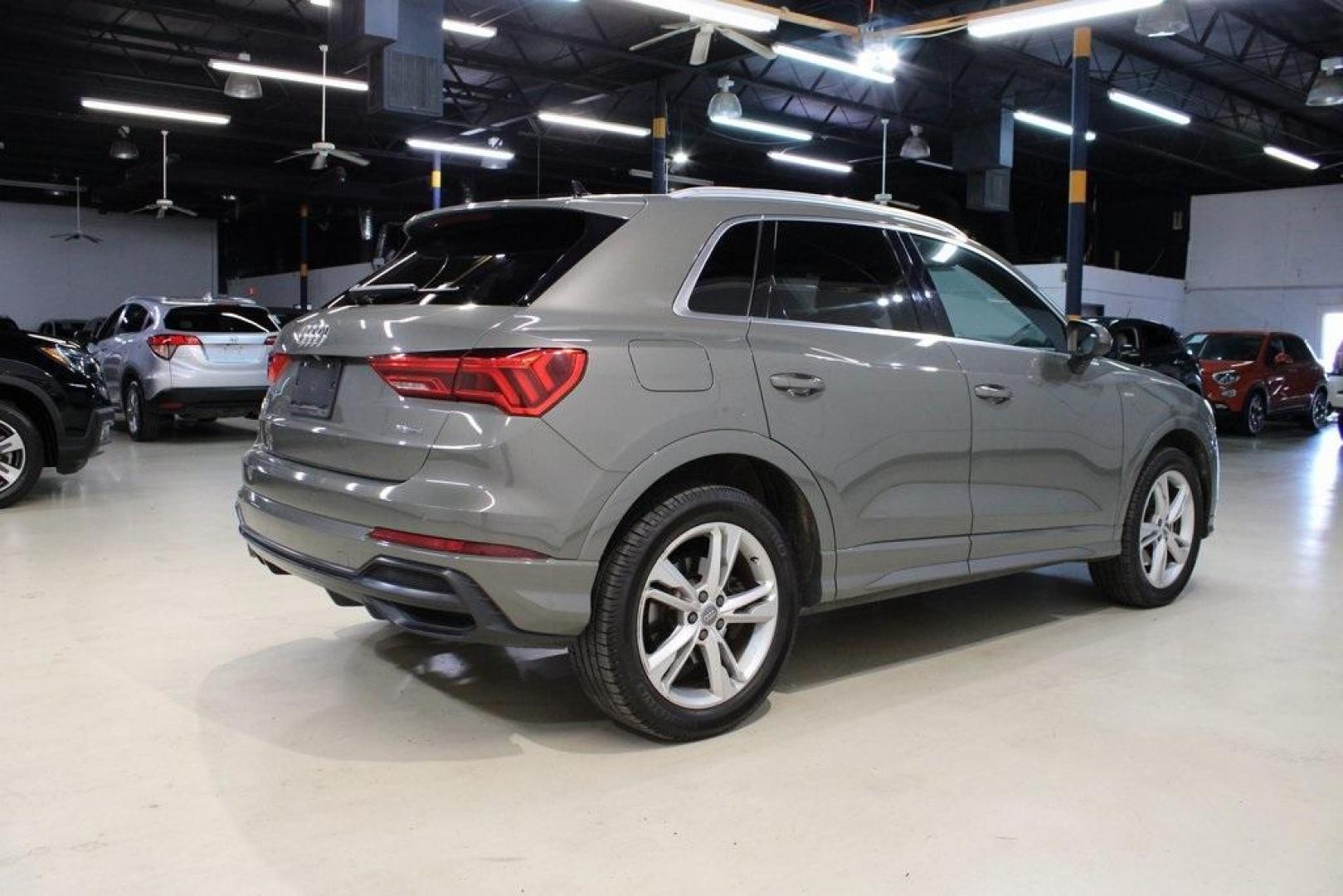 2020 Gray Metallic /Black Audi Q3 Premium S line (WA1DECF36L1) with an 2.0L 4-Cylinder TFSI engine, Automatic transmission, located at 15300 Midway Rd., Addison, TX, 75001, (972) 702-0011, 32.958321, -96.838074 - 2020 Audi Q3 Premium Plus<br>Now Available at Midway Auto Group Addison, Texas<br><br>Stylish, agile, and upscale, the 2020 Audi Q3 Premium Plus delivers the luxury of a full-size SUV in a versatile compact package. With Audis Quattro all-wheel drive, a refined interior, and a wealth of technology, - Photo#2