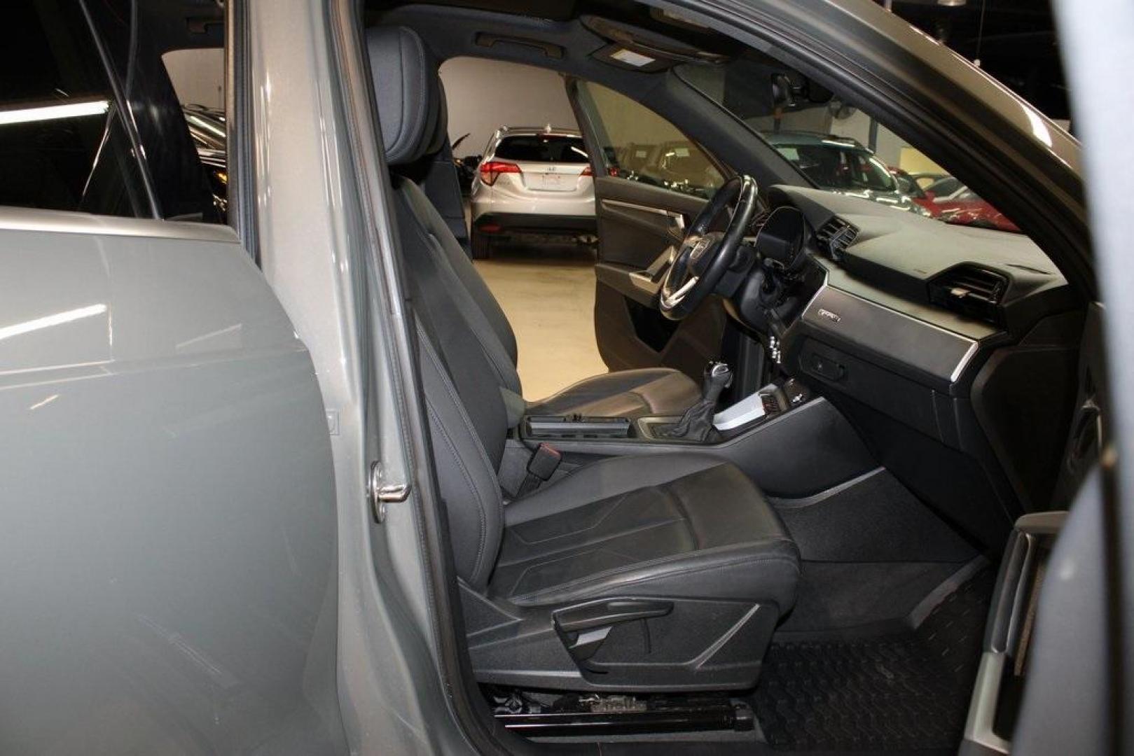 2020 Gray Metallic /Black Audi Q3 Premium S line (WA1DECF36L1) with an 2.0L 4-Cylinder TFSI engine, Automatic transmission, located at 15300 Midway Rd., Addison, TX, 75001, (972) 702-0011, 32.958321, -96.838074 - 2020 Audi Q3 Premium Plus<br>Now Available at Midway Auto Group Addison, Texas<br><br>Stylish, agile, and upscale, the 2020 Audi Q3 Premium Plus delivers the luxury of a full-size SUV in a versatile compact package. With Audis Quattro all-wheel drive, a refined interior, and a wealth of technology, - Photo#12
