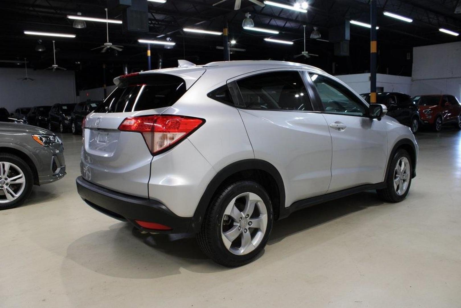 2016 Alabaster Silver Metallic Honda HR-V EX-L (3CZRU5H76GM) with an 1.8L I4 SOHC 16V i-VTEC engine, CVT transmission, located at 15300 Midway Rd., Addison, TX, 75001, (972) 702-0011, 32.958321, -96.838074 - Photo#2