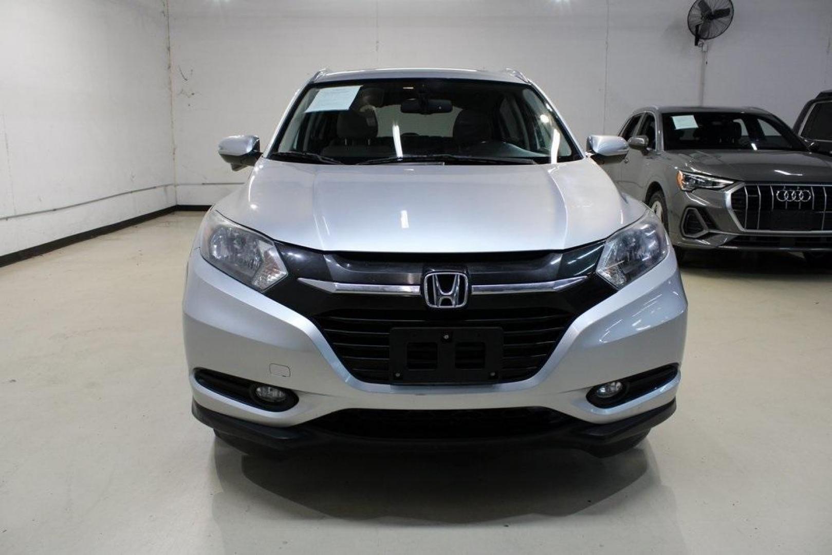 2016 Alabaster Silver Metallic Honda HR-V EX-L (3CZRU5H76GM) with an 1.8L I4 SOHC 16V i-VTEC engine, CVT transmission, located at 15300 Midway Rd., Addison, TX, 75001, (972) 702-0011, 32.958321, -96.838074 - Photo#4