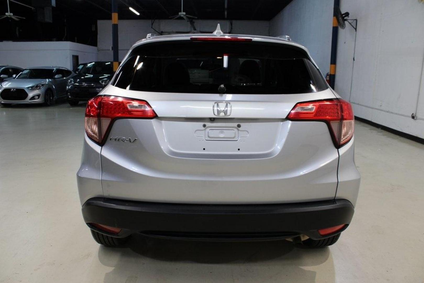 2016 Alabaster Silver Metallic Honda HR-V EX-L (3CZRU5H76GM) with an 1.8L I4 SOHC 16V i-VTEC engine, CVT transmission, located at 15300 Midway Rd., Addison, TX, 75001, (972) 702-0011, 32.958321, -96.838074 - Photo#5