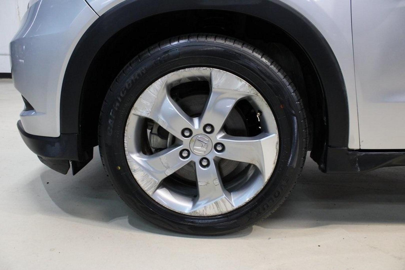 2016 Alabaster Silver Metallic Honda HR-V EX-L (3CZRU5H76GM) with an 1.8L I4 SOHC 16V i-VTEC engine, CVT transmission, located at 15300 Midway Rd., Addison, TX, 75001, (972) 702-0011, 32.958321, -96.838074 - Photo#6