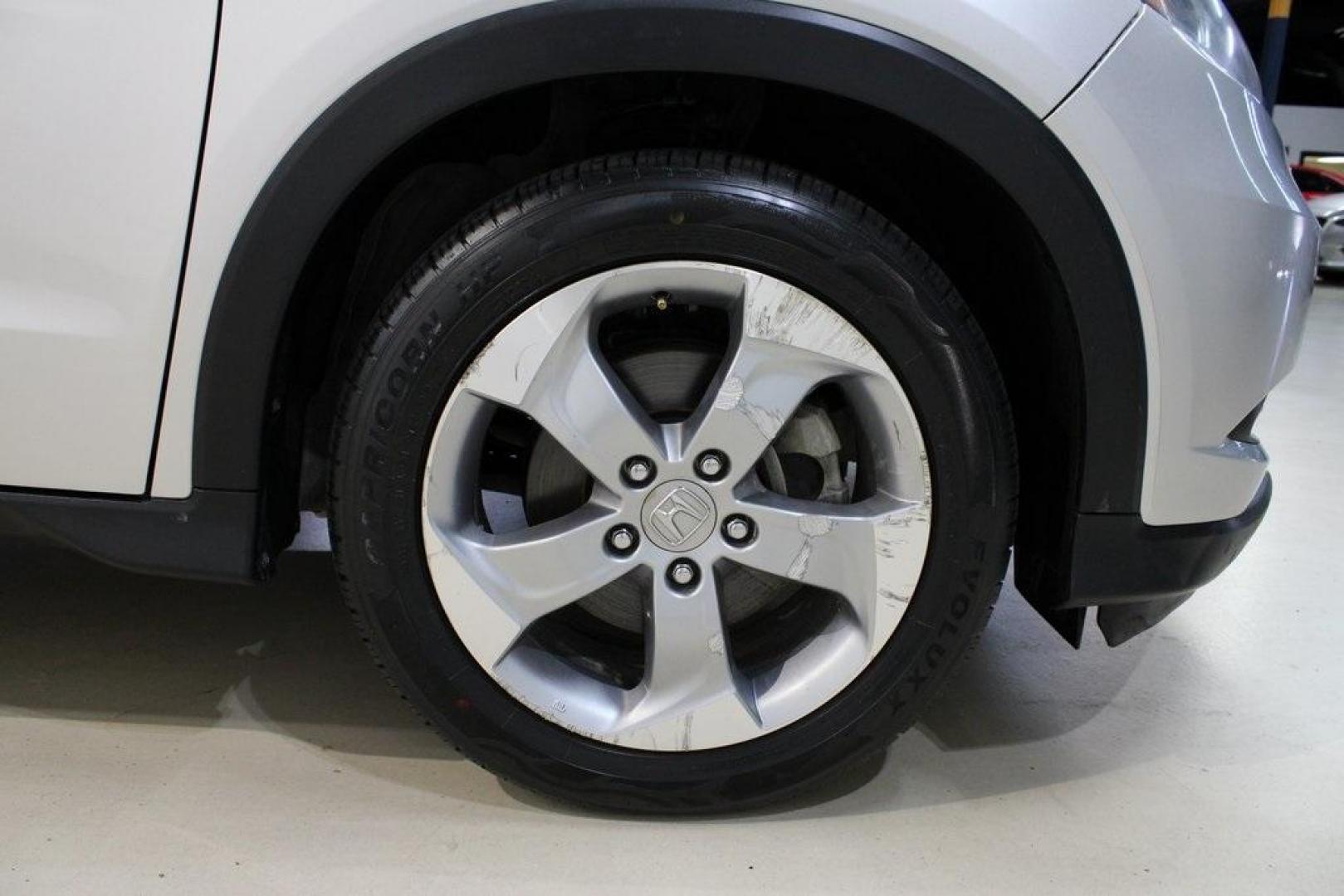 2016 Alabaster Silver Metallic Honda HR-V EX-L (3CZRU5H76GM) with an 1.8L I4 SOHC 16V i-VTEC engine, CVT transmission, located at 15300 Midway Rd., Addison, TX, 75001, (972) 702-0011, 32.958321, -96.838074 - Photo#9