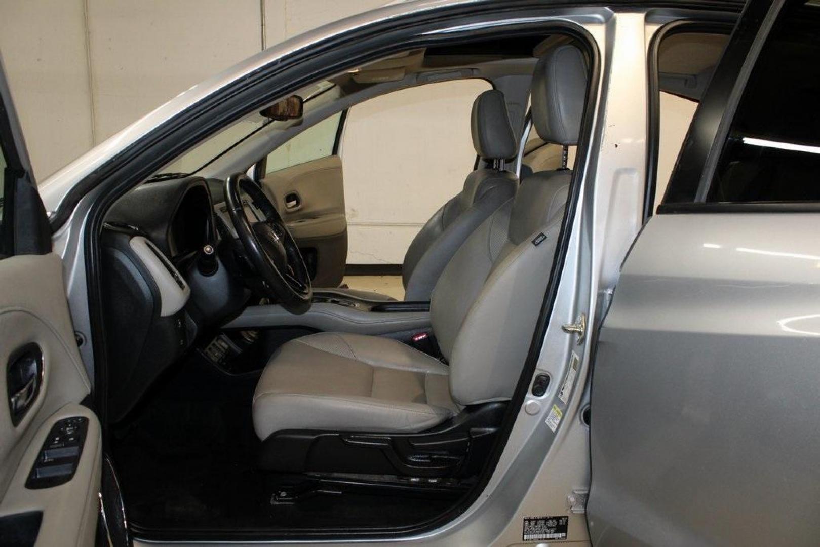2016 Alabaster Silver Metallic Honda HR-V EX-L (3CZRU5H76GM) with an 1.8L I4 SOHC 16V i-VTEC engine, CVT transmission, located at 15300 Midway Rd., Addison, TX, 75001, (972) 702-0011, 32.958321, -96.838074 - Photo#11