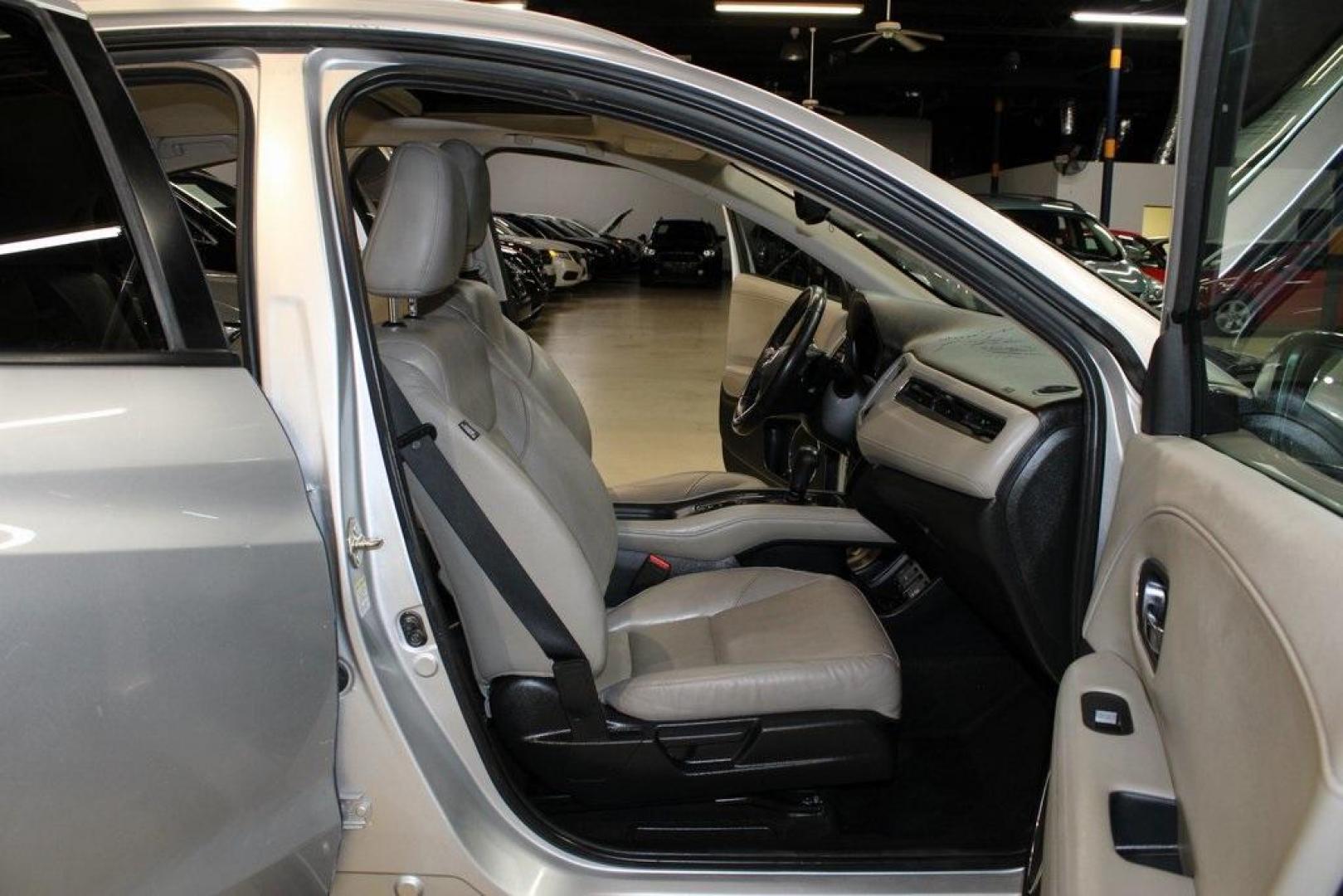 2016 Alabaster Silver Metallic Honda HR-V EX-L (3CZRU5H76GM) with an 1.8L I4 SOHC 16V i-VTEC engine, CVT transmission, located at 15300 Midway Rd., Addison, TX, 75001, (972) 702-0011, 32.958321, -96.838074 - Photo#12