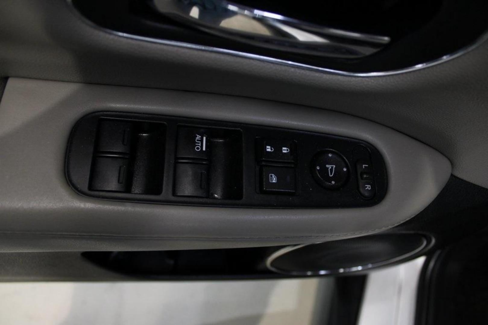 2016 Alabaster Silver Metallic Honda HR-V EX-L (3CZRU5H76GM) with an 1.8L I4 SOHC 16V i-VTEC engine, CVT transmission, located at 15300 Midway Rd., Addison, TX, 75001, (972) 702-0011, 32.958321, -96.838074 - Photo#21